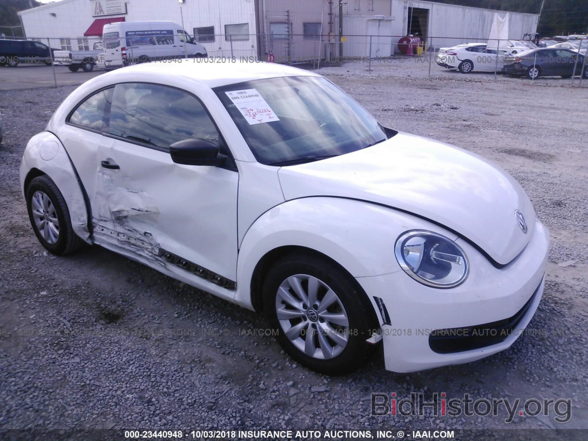 Фотография 3VWFP7AT3DM618825 - Volkswagen Beetle 2013