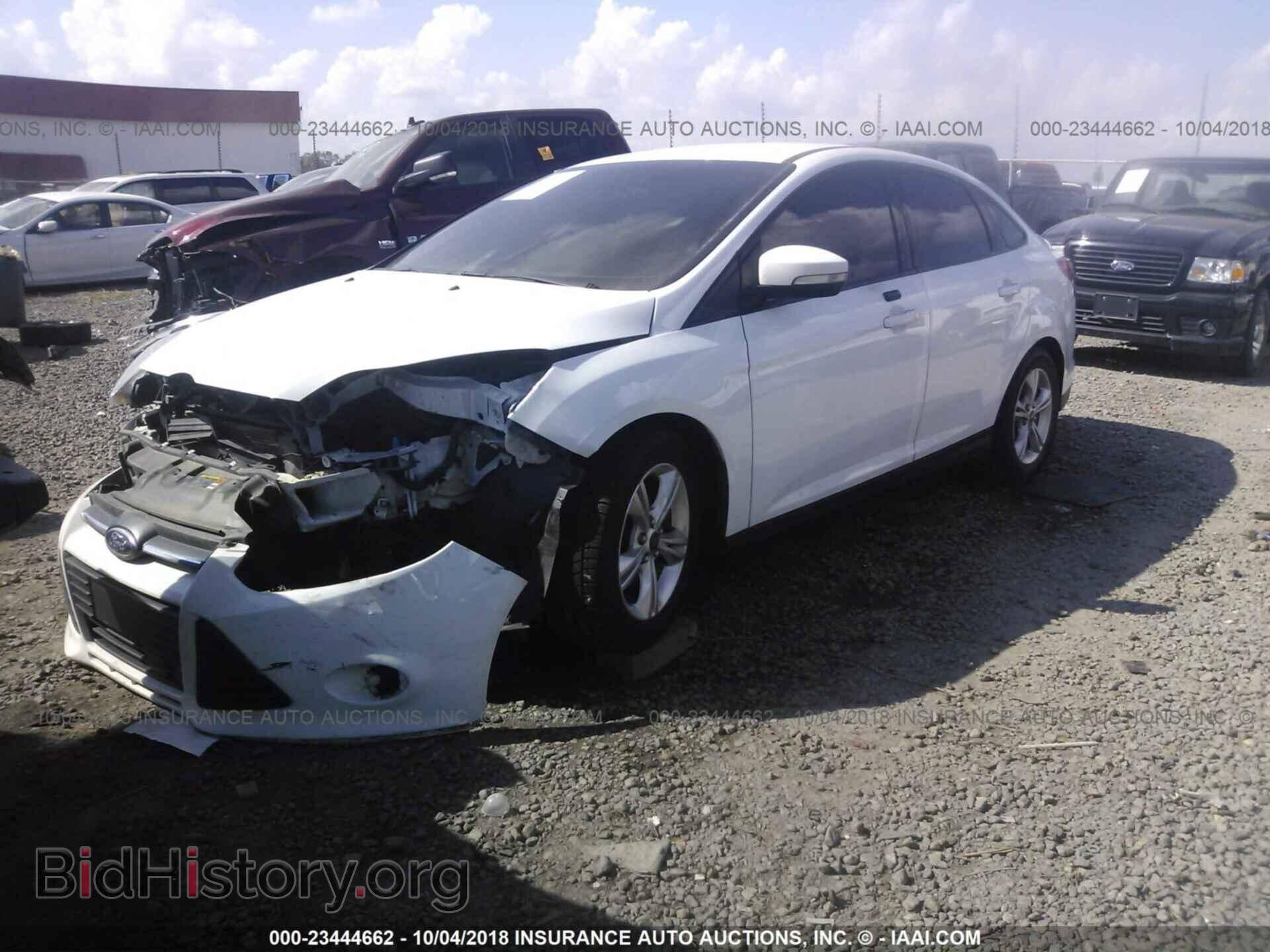 2014 Ford Focus - VIN: 1FADP3F26EL222142 - Фото 2