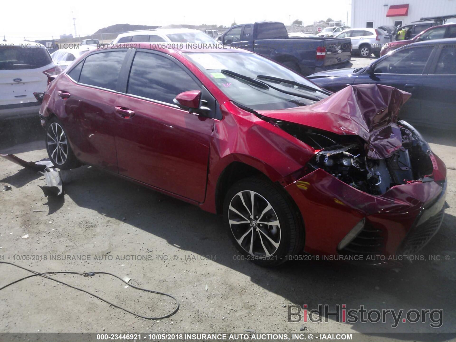 Photo 5YFBURHE3KP877950 - Toyota Corolla 2019