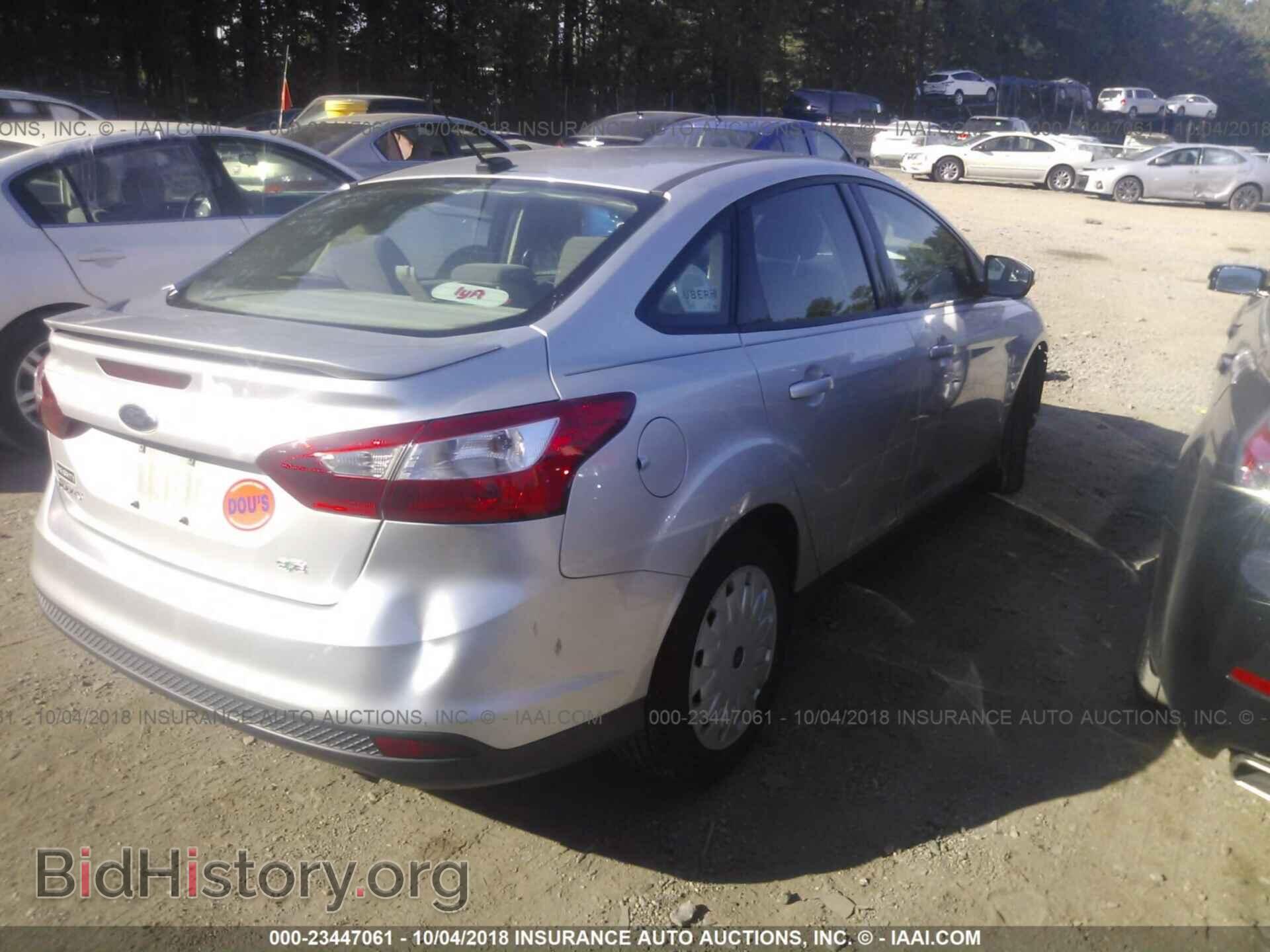 2012 Ford Focus - VIN: 1FAHP3F27CL317825 - Photo 4