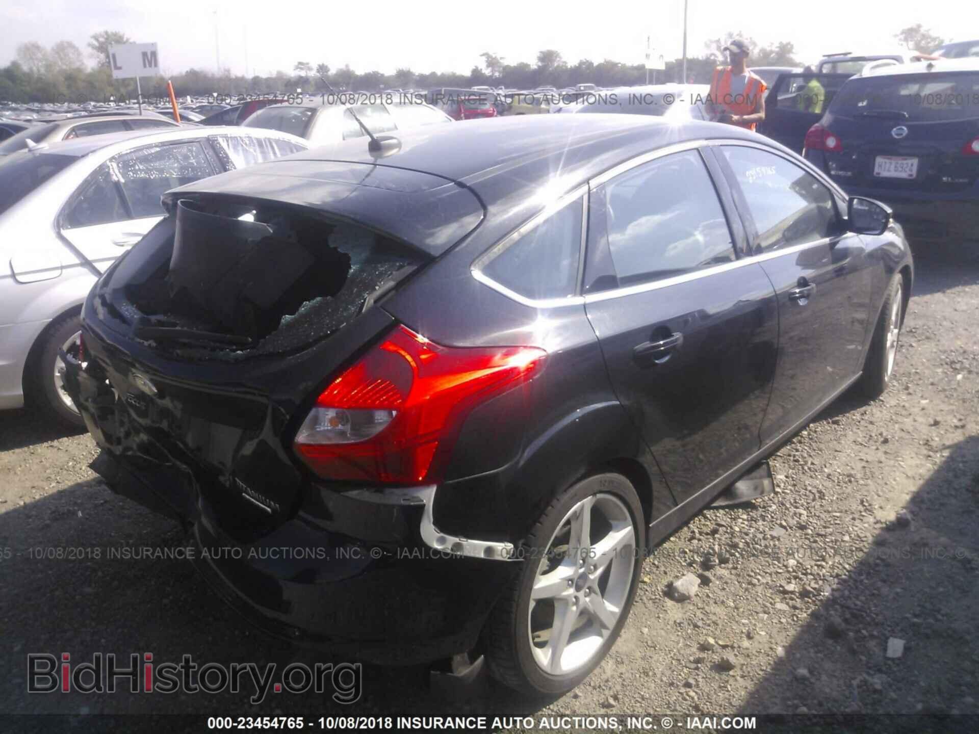 2014 Ford Focus - VIN: 1FADP3N22EL194230 - Фото 4