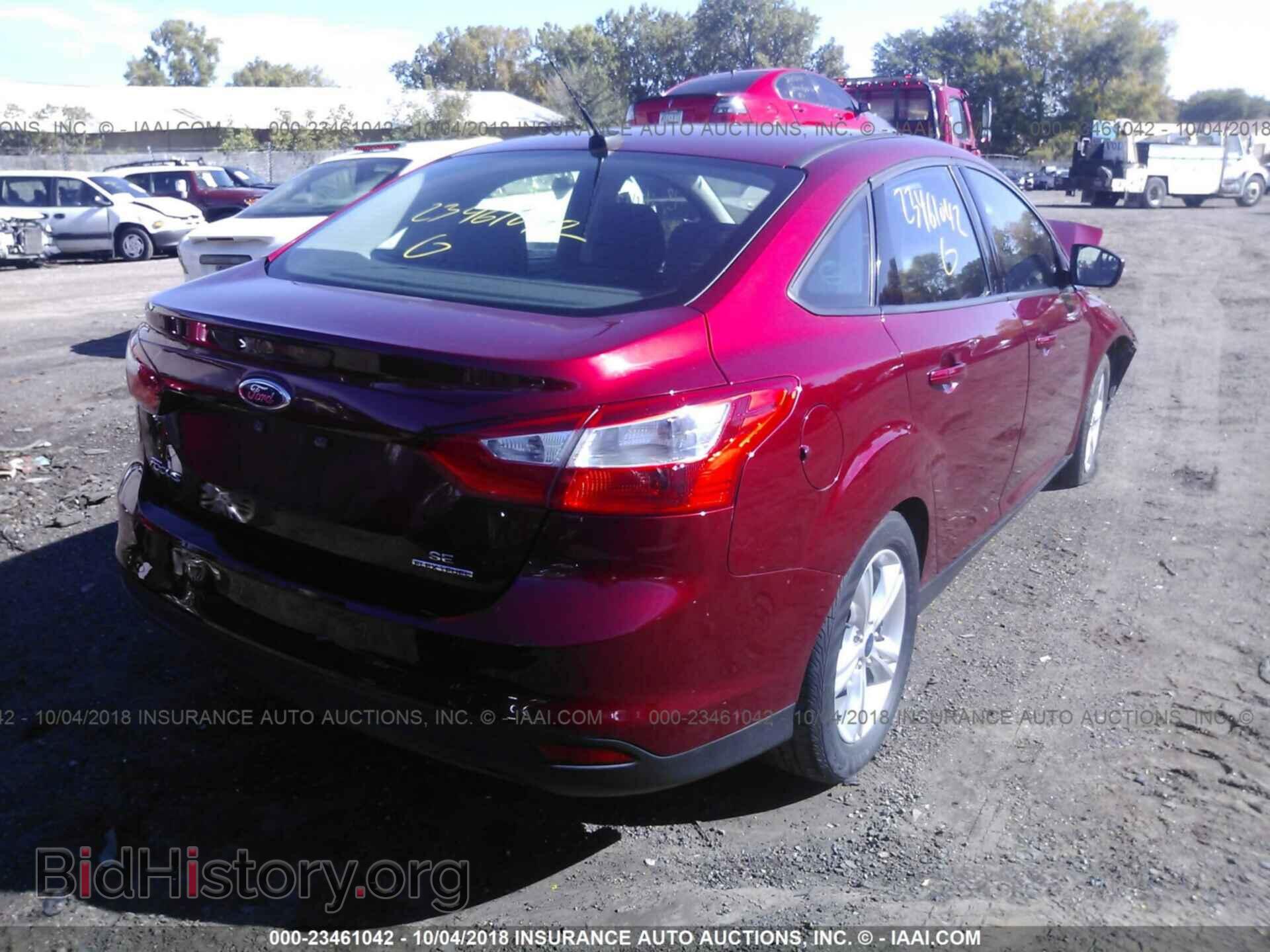 2014 Ford Focus - VIN: 1FADP3F28EL399243 - Фото 4