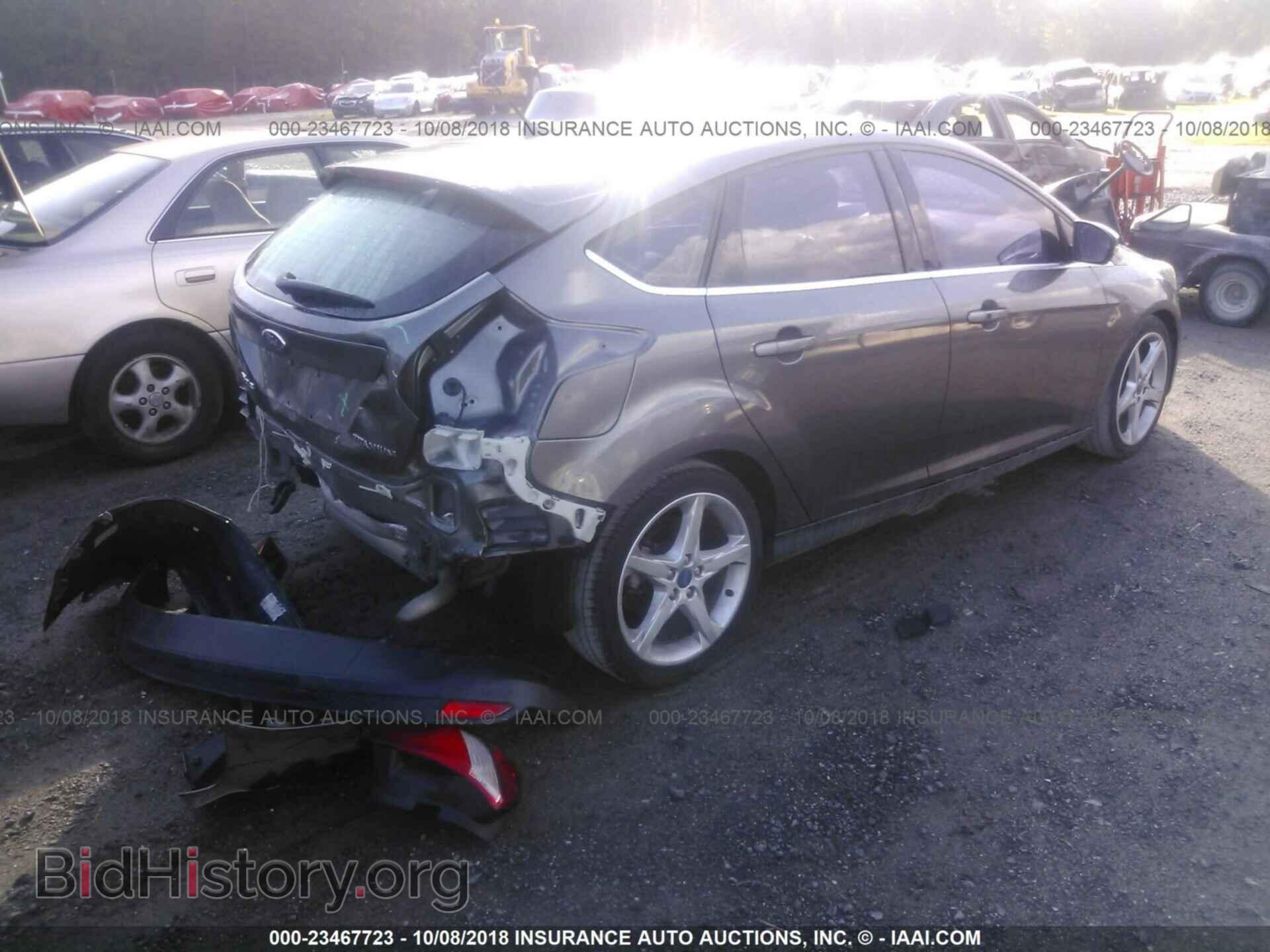2012 Ford Focus - VIN: 1FAHP3N22CL241447 - Photo 4