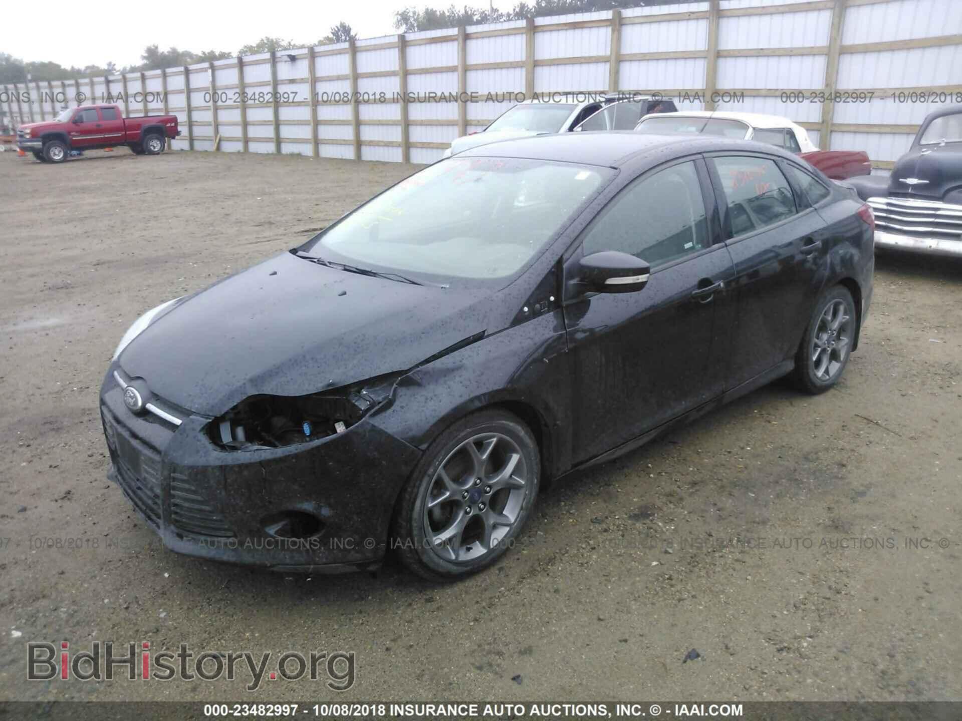 2014 Ford Focus - VIN: 1FADP3F22EL413671 - Фото 2