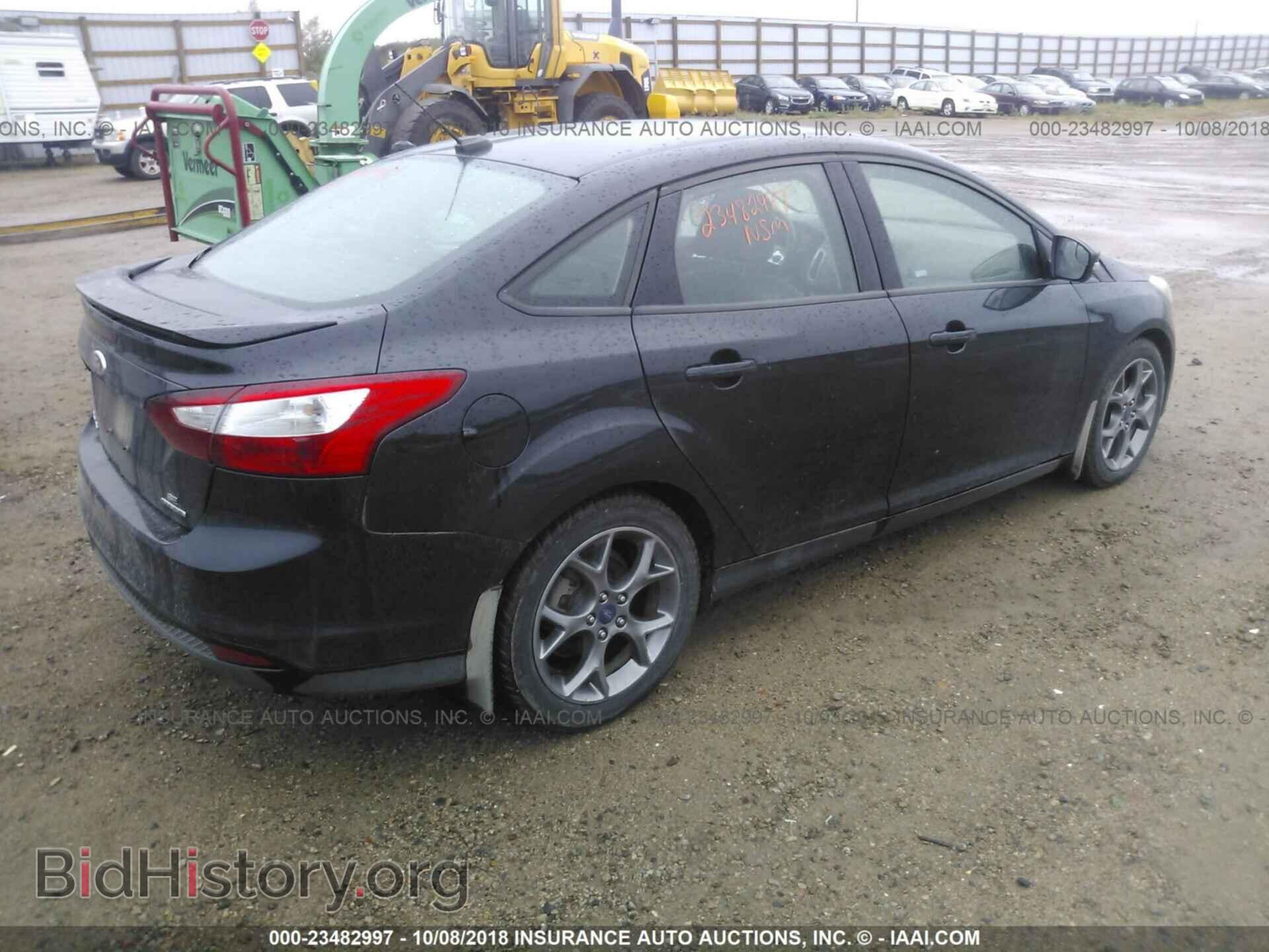 2014 Ford Focus - VIN: 1FADP3F22EL413671 - Фото 4