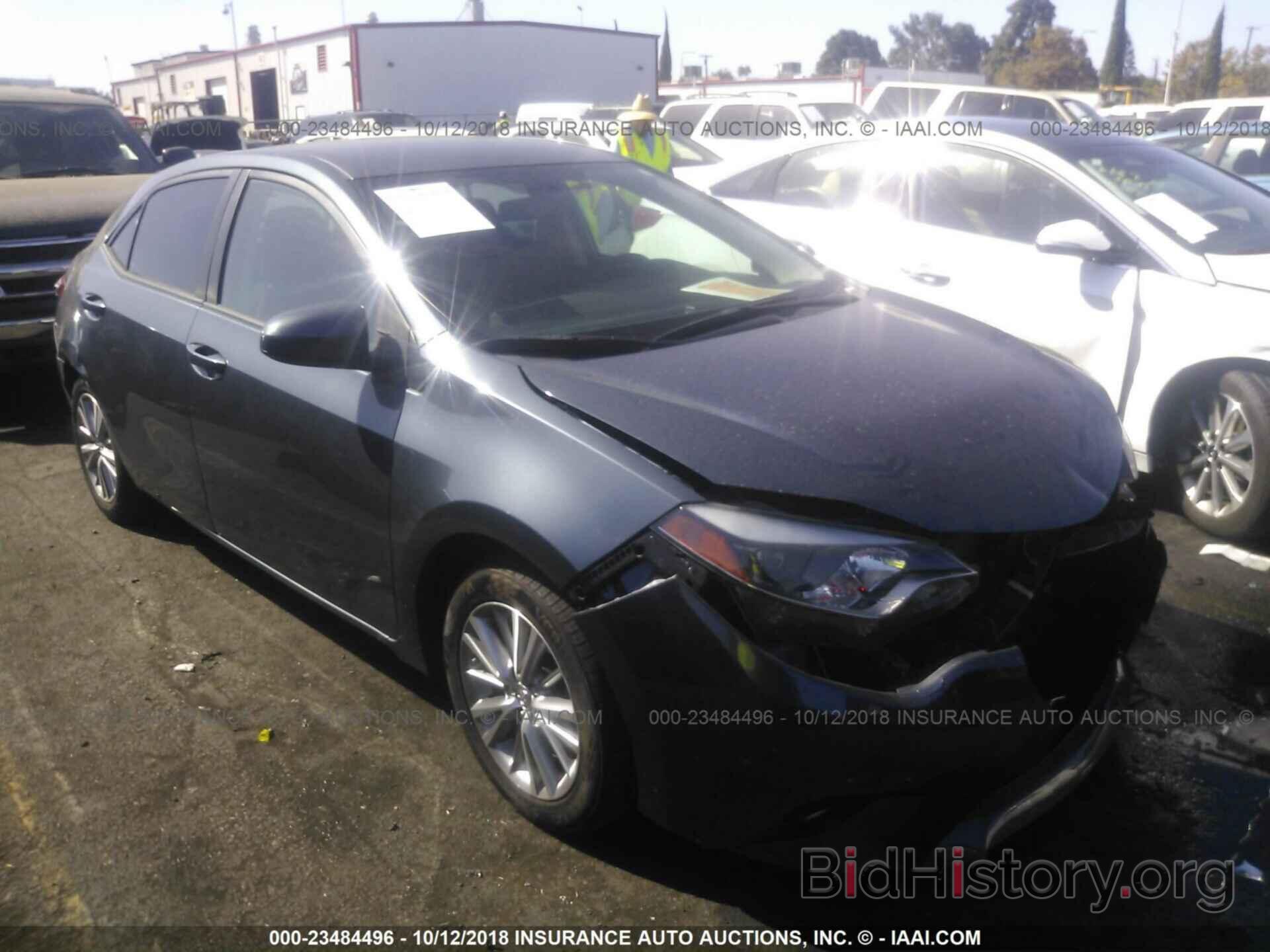 Photo 5YFBURHE0EP099532 - Toyota Corolla 2014