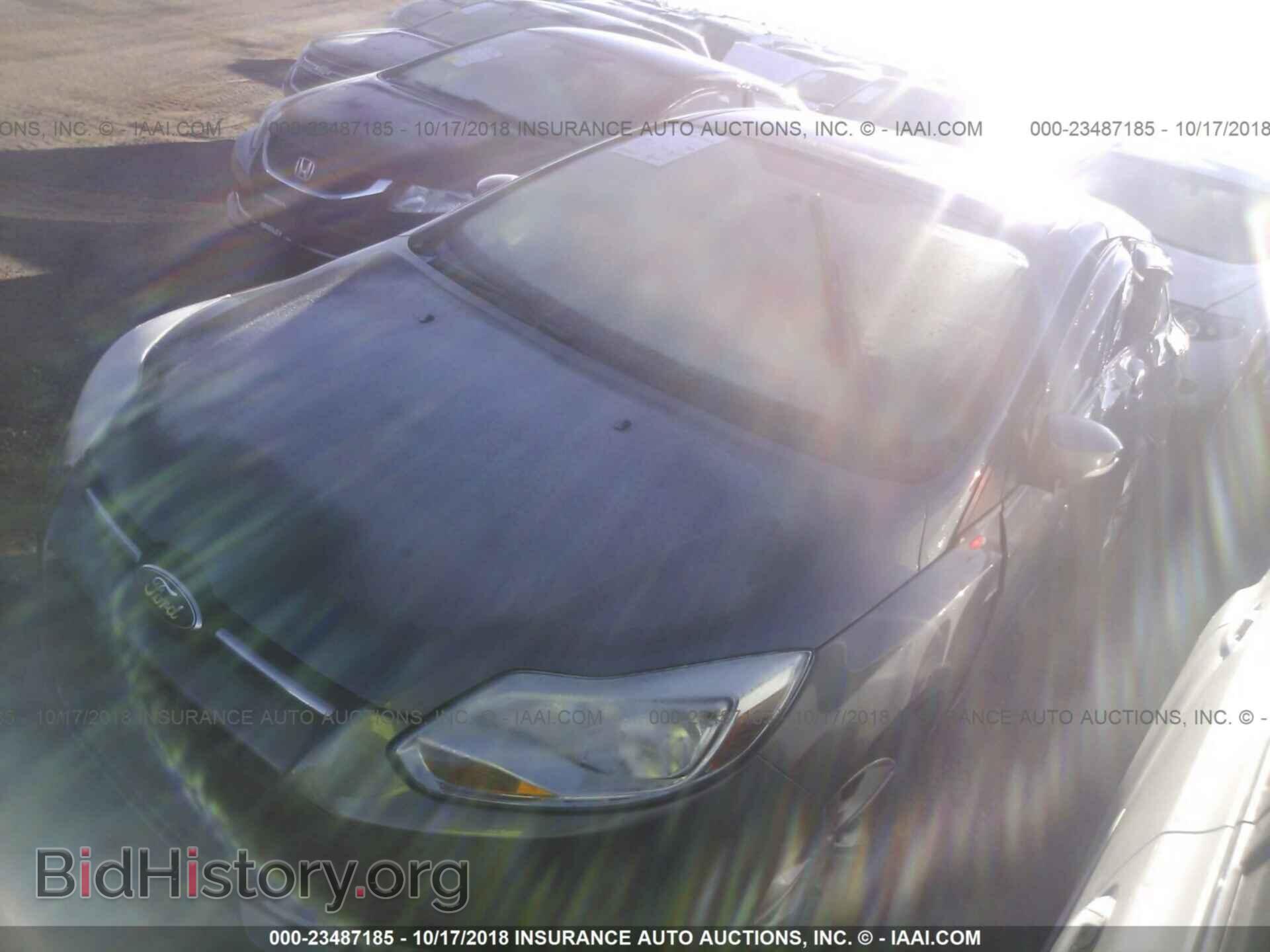 2014 Ford Focus - VIN: 1FADP3F2XEL218871 - Фото 2
