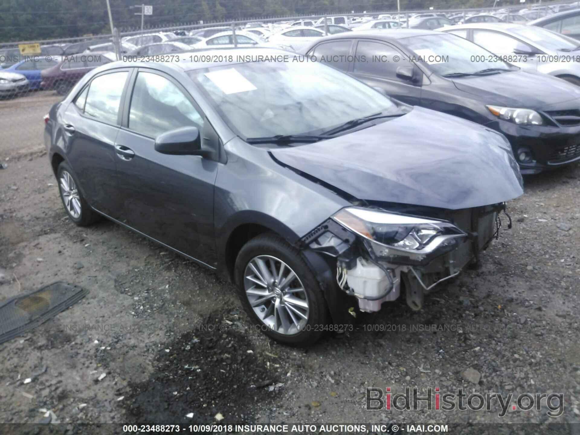 Photo 5YFBURHE6EP042333 - Toyota Corolla 2014