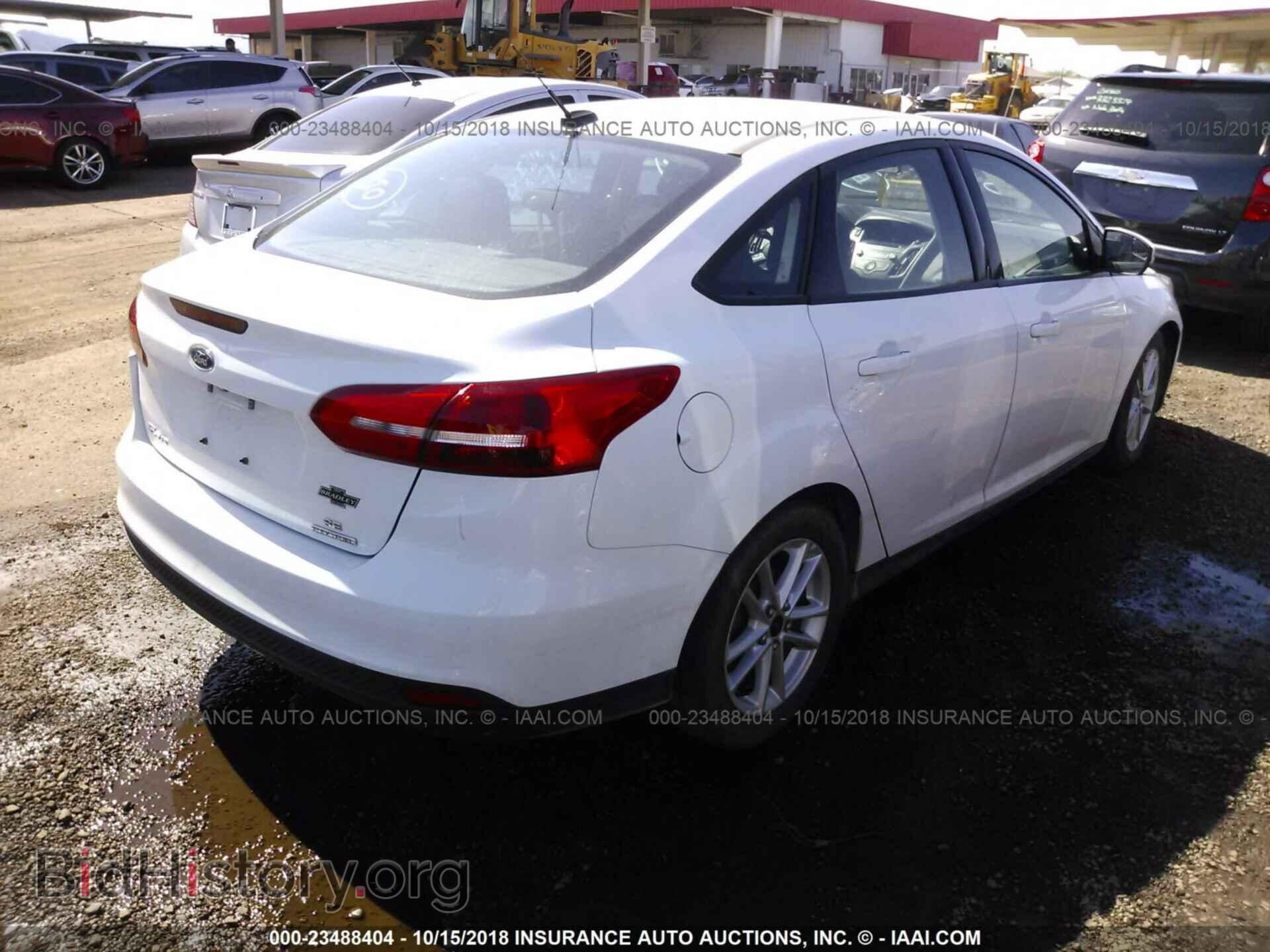 2016 Ford Focus - VIN: 1FADP3F29GL258961 - Photo 4