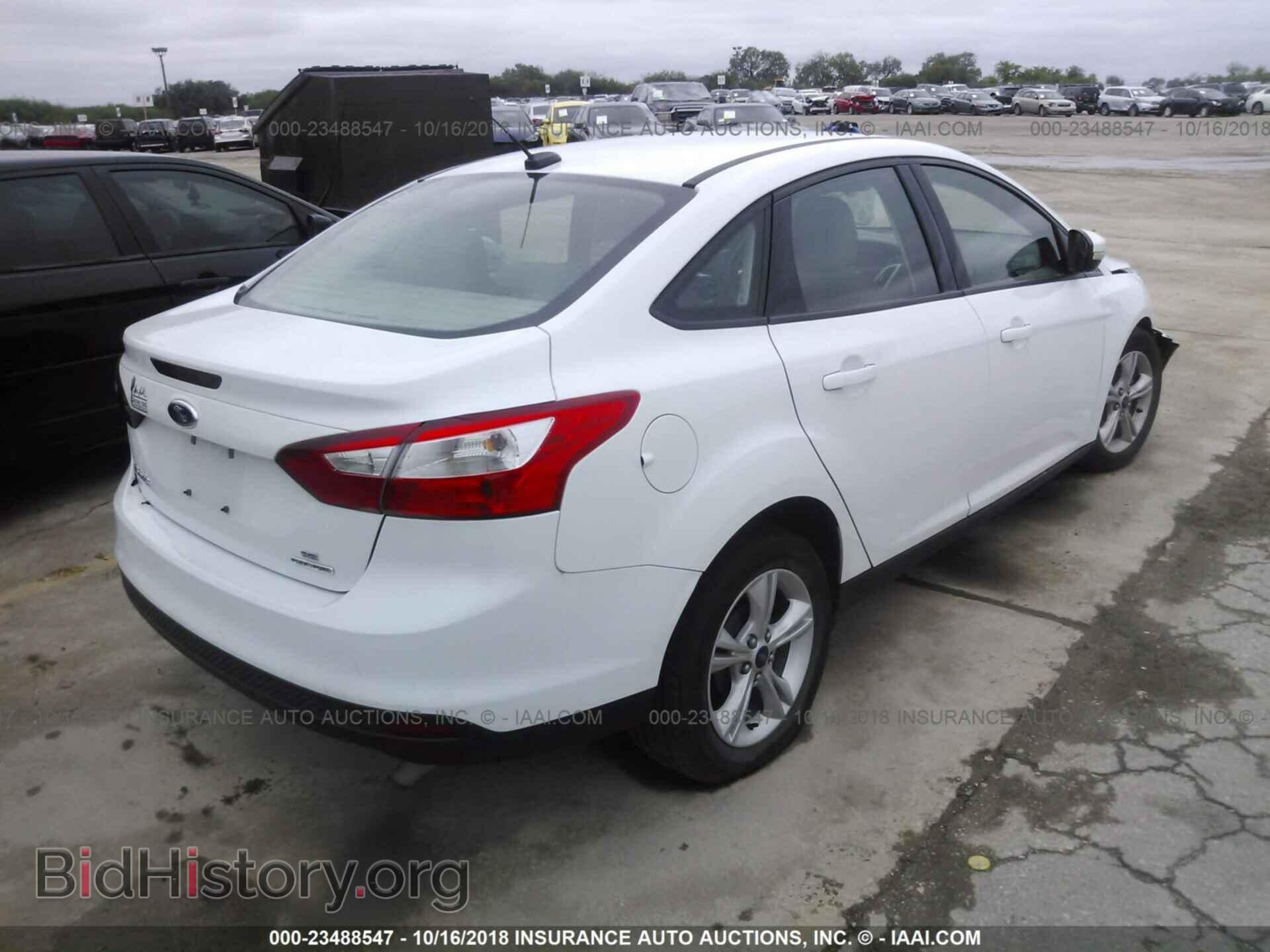 2014 Ford Focus - VIN: 1FADP3F20EL440237 - Фото 4