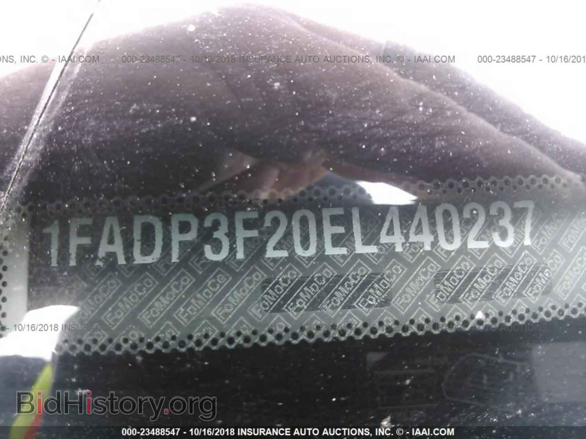 2014 Ford Focus - VIN: 1FADP3F20EL440237 - Фото 9