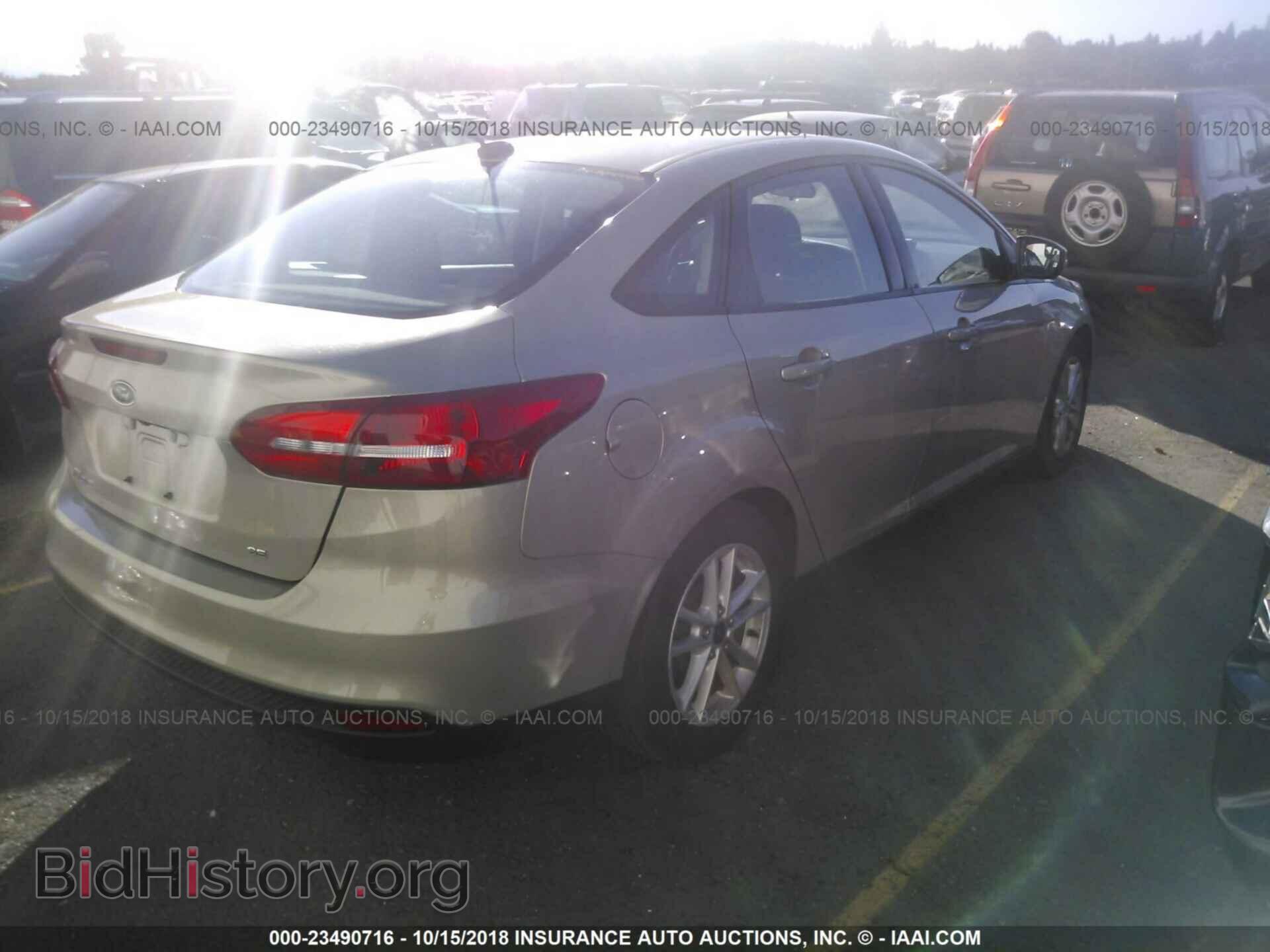 2015 Ford Focus - VIN: 1FADP3F29FL358640 - Photo 4