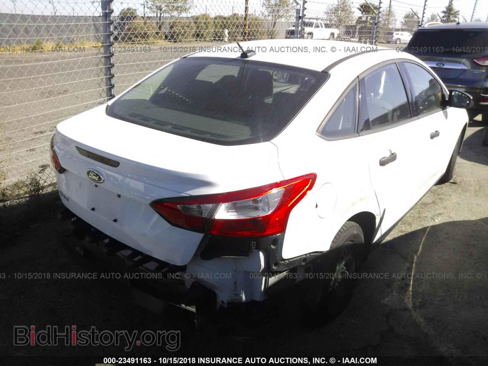 2013 Ford Focus - VIN: 1FADP3E22DL178110 - Фото 4