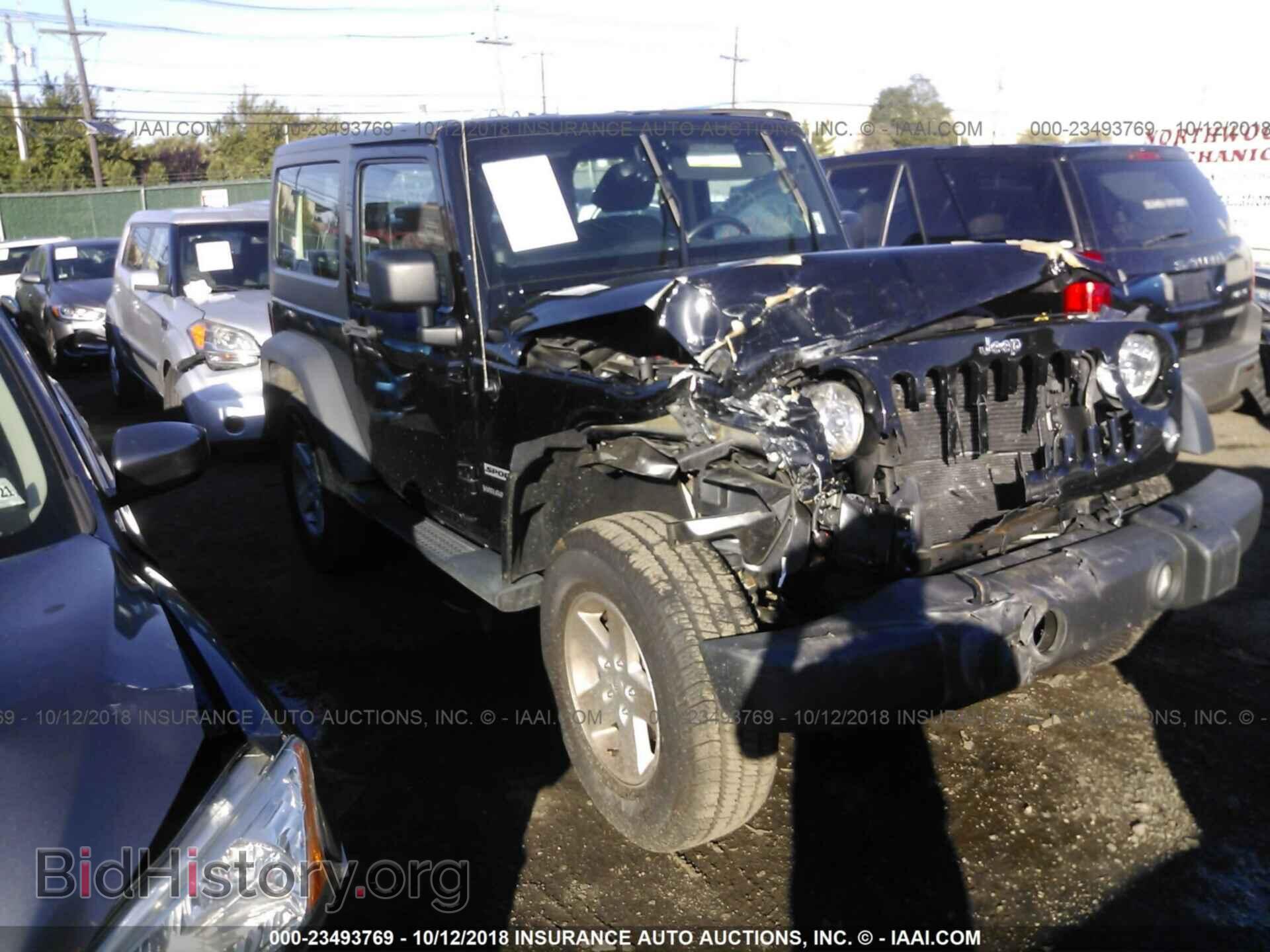 Фотография 1C4AJWAGXEL243076 - Jeep Wrangler 2014