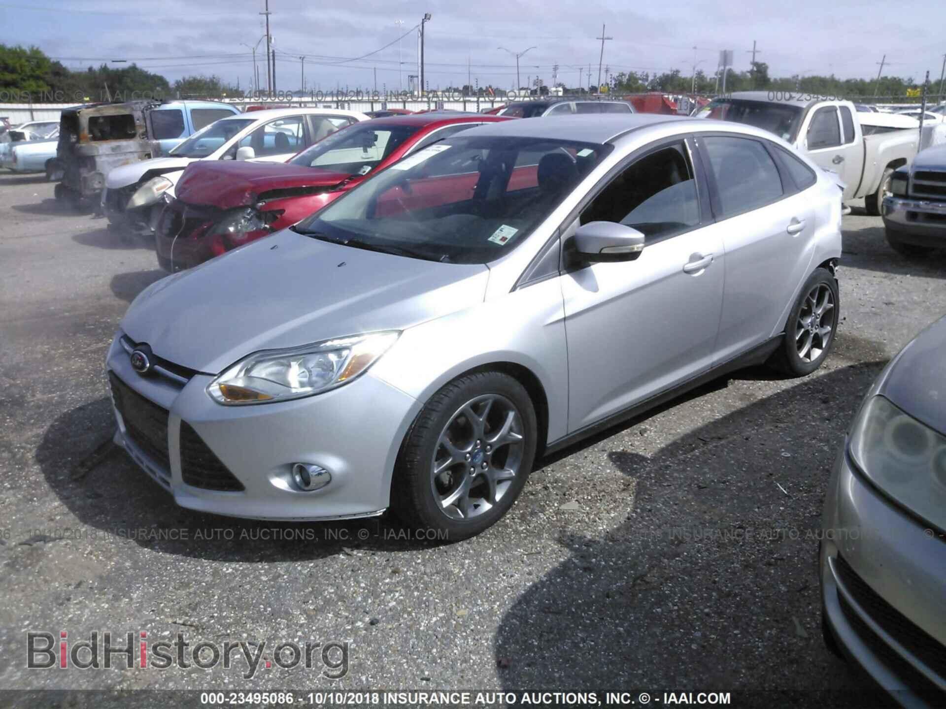 2013 Ford Focus - VIN: 1FADP3F22DL104586 - Фото 2