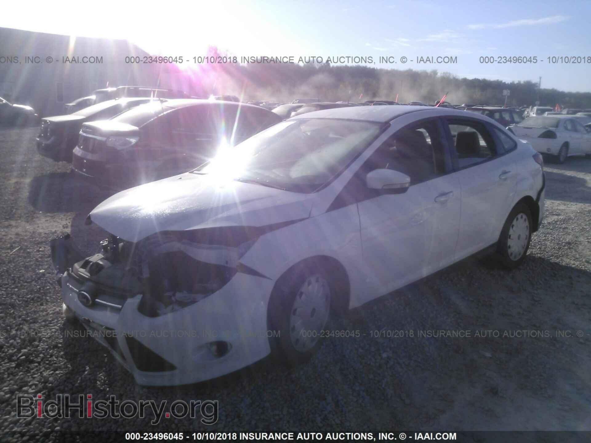 2014 Ford Focus - VIN: 1FADP3F25EL331157 - Фото 2