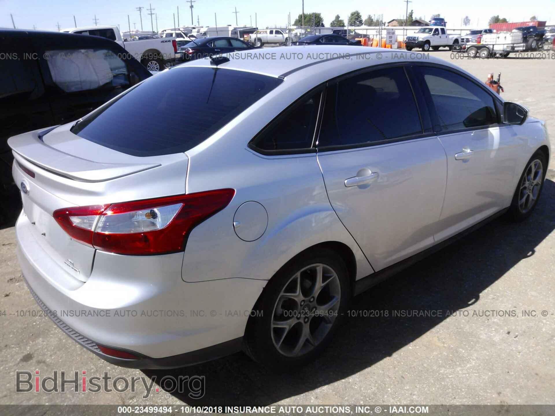 2014 Ford Focus - VIN: 1FADP3F25EL224741 - Photo 4