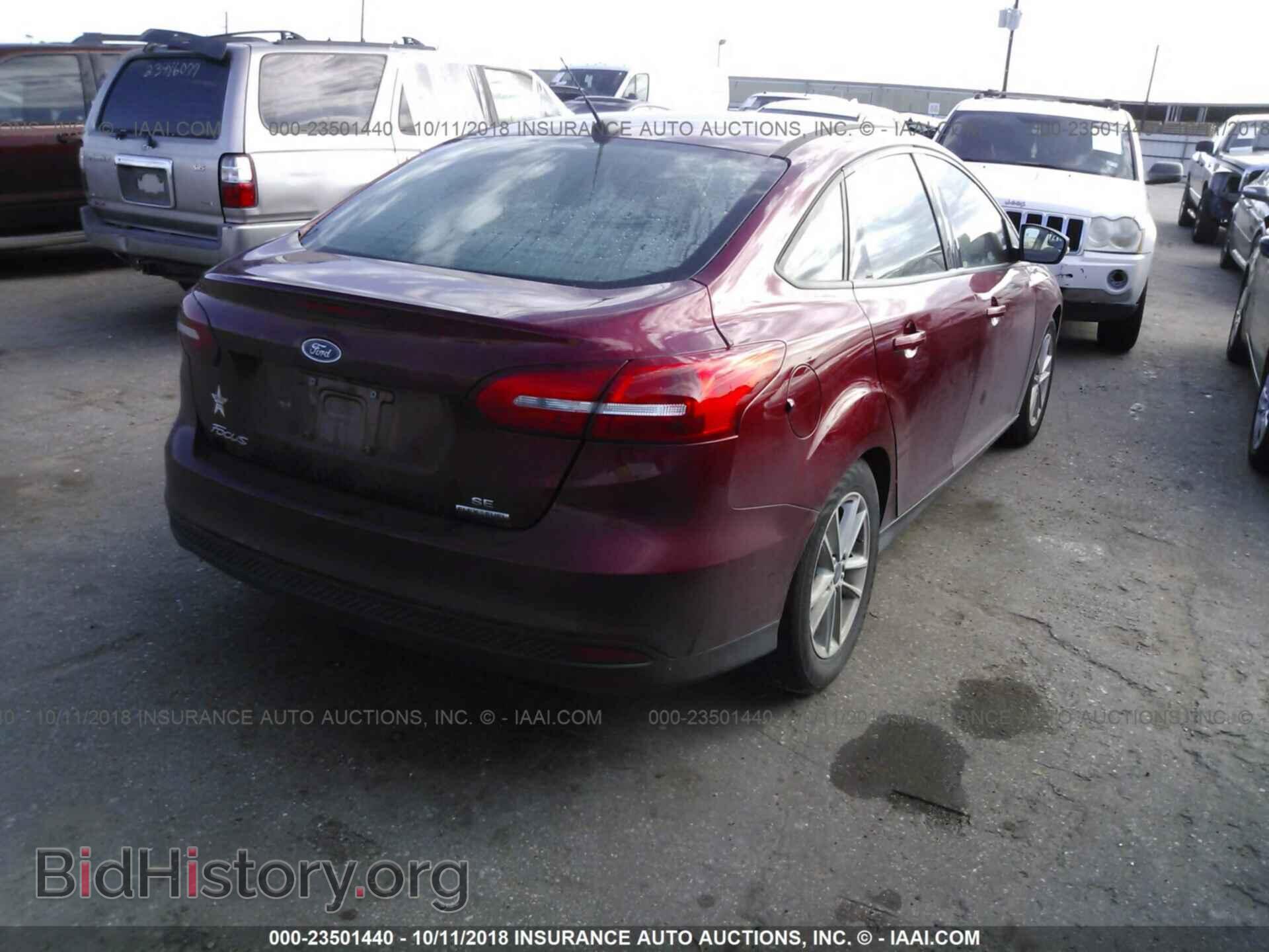 2016 Ford Focus - VIN: 1FADP3F21GL391102 - Photo 4