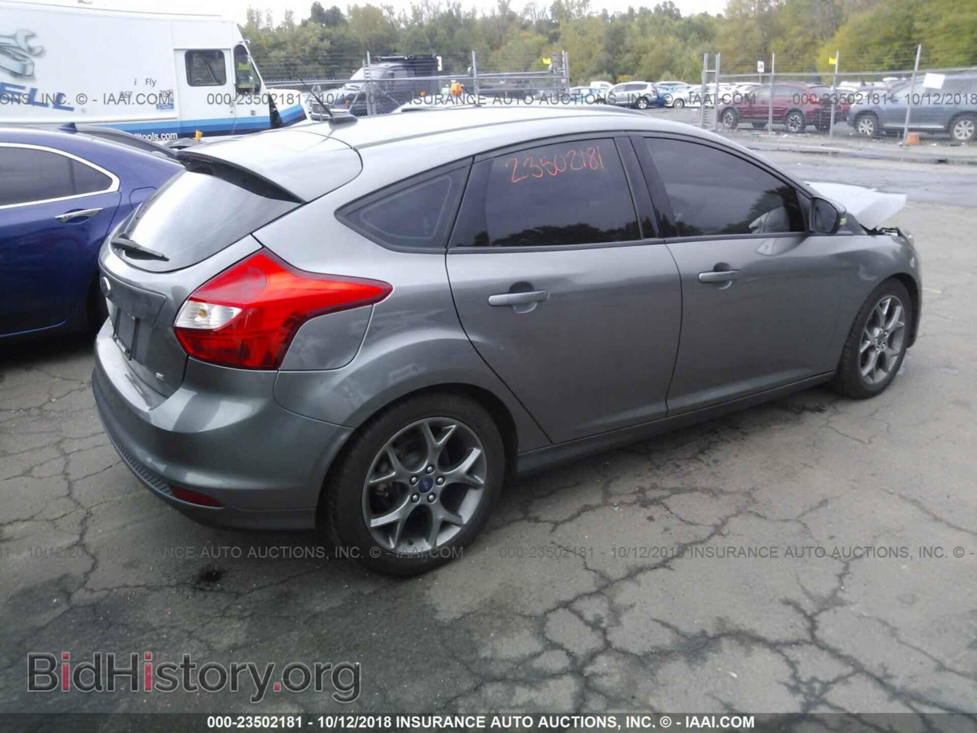 2014 Ford Focus - VIN: 1FADP3K23EL198517 - Фото 4