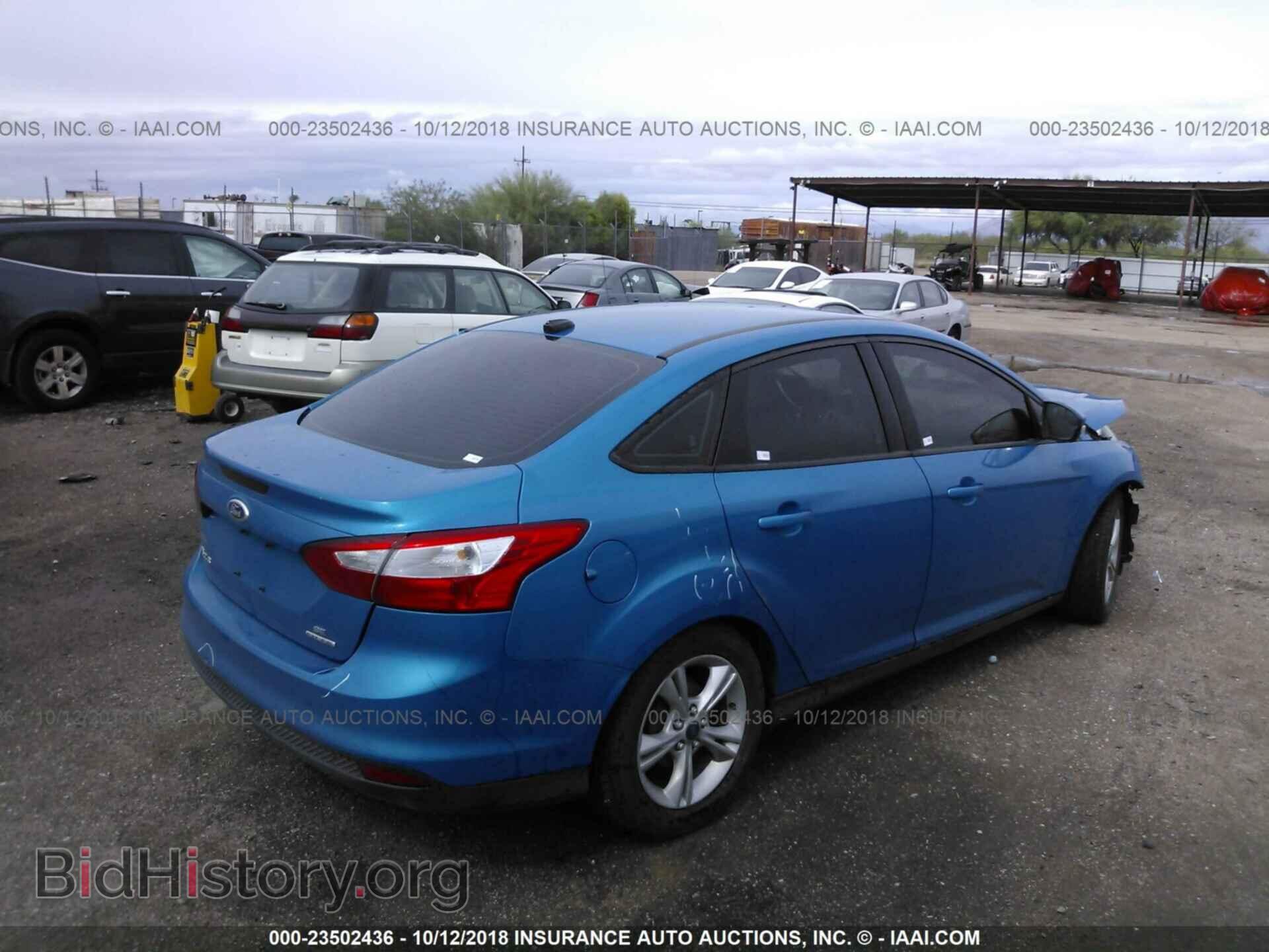 2014 Ford Focus - VIN: 1FADP3F22EL453863 - Photo 4