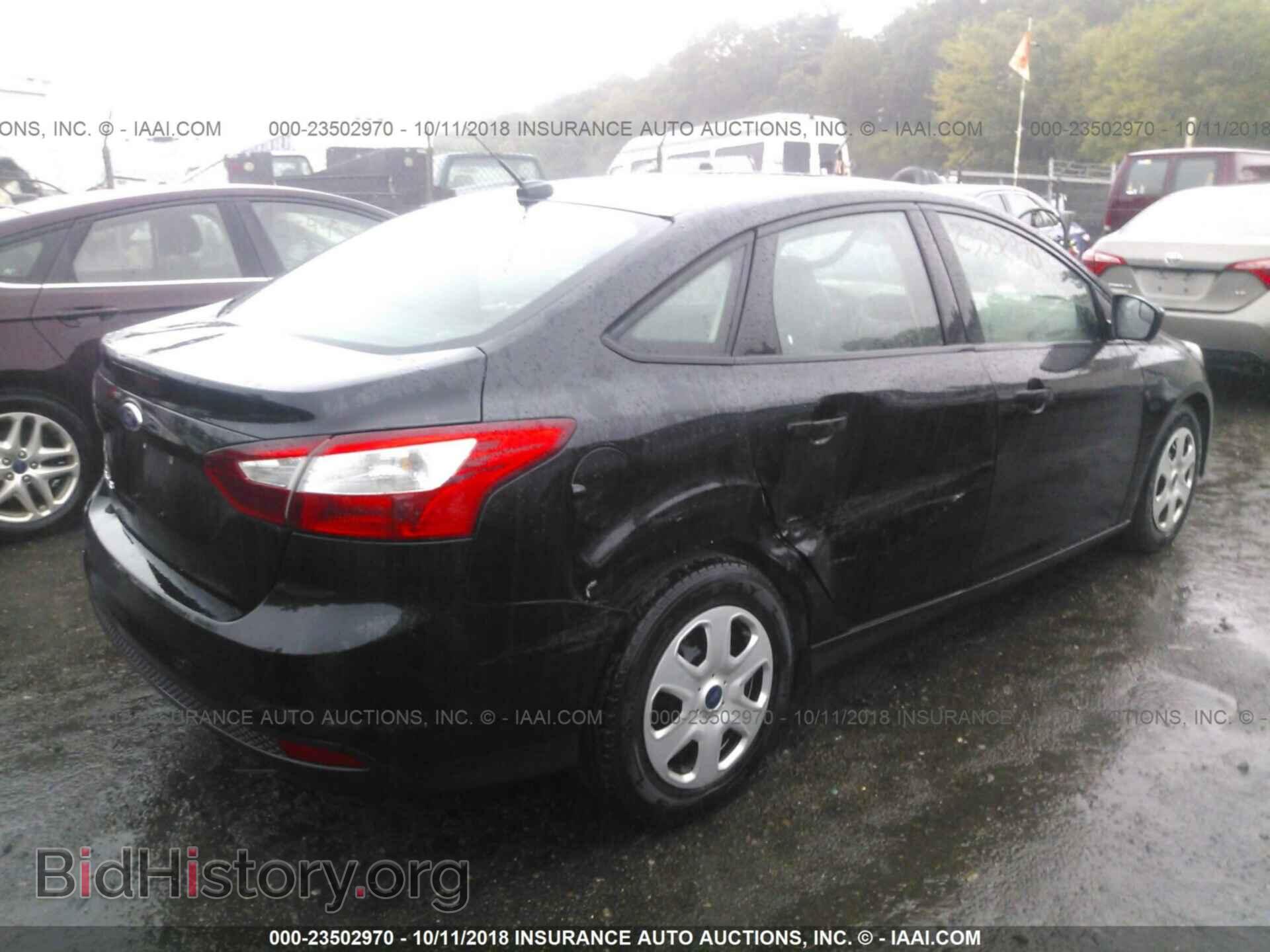 2014 Ford Focus - VIN: 1FADP3E29EL344236 - Photo 4