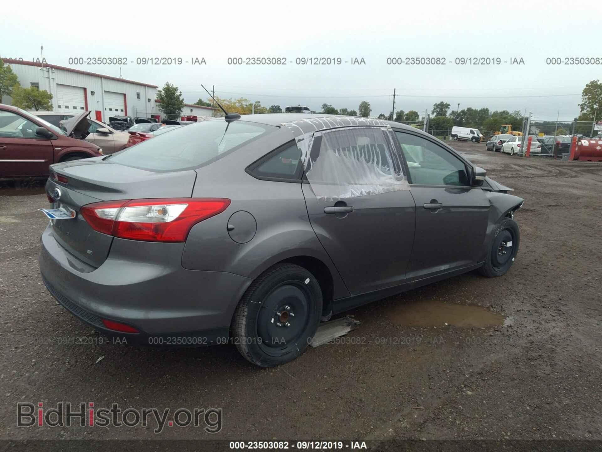 2014 FORD FOCUS - VIN: 1FADP3F2XEL344096 - Photo 4