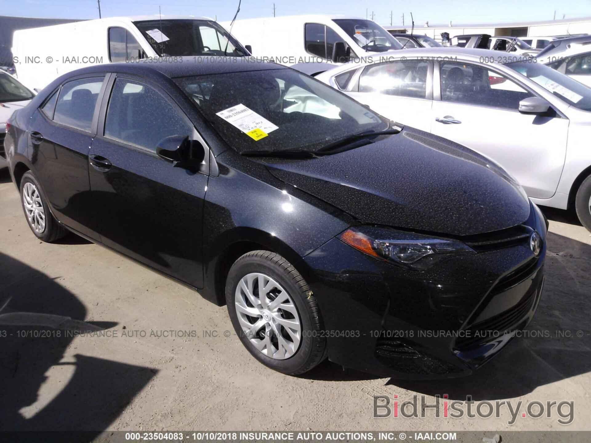 Photo 5YFBURHE3KP872988 - Toyota Corolla 2019