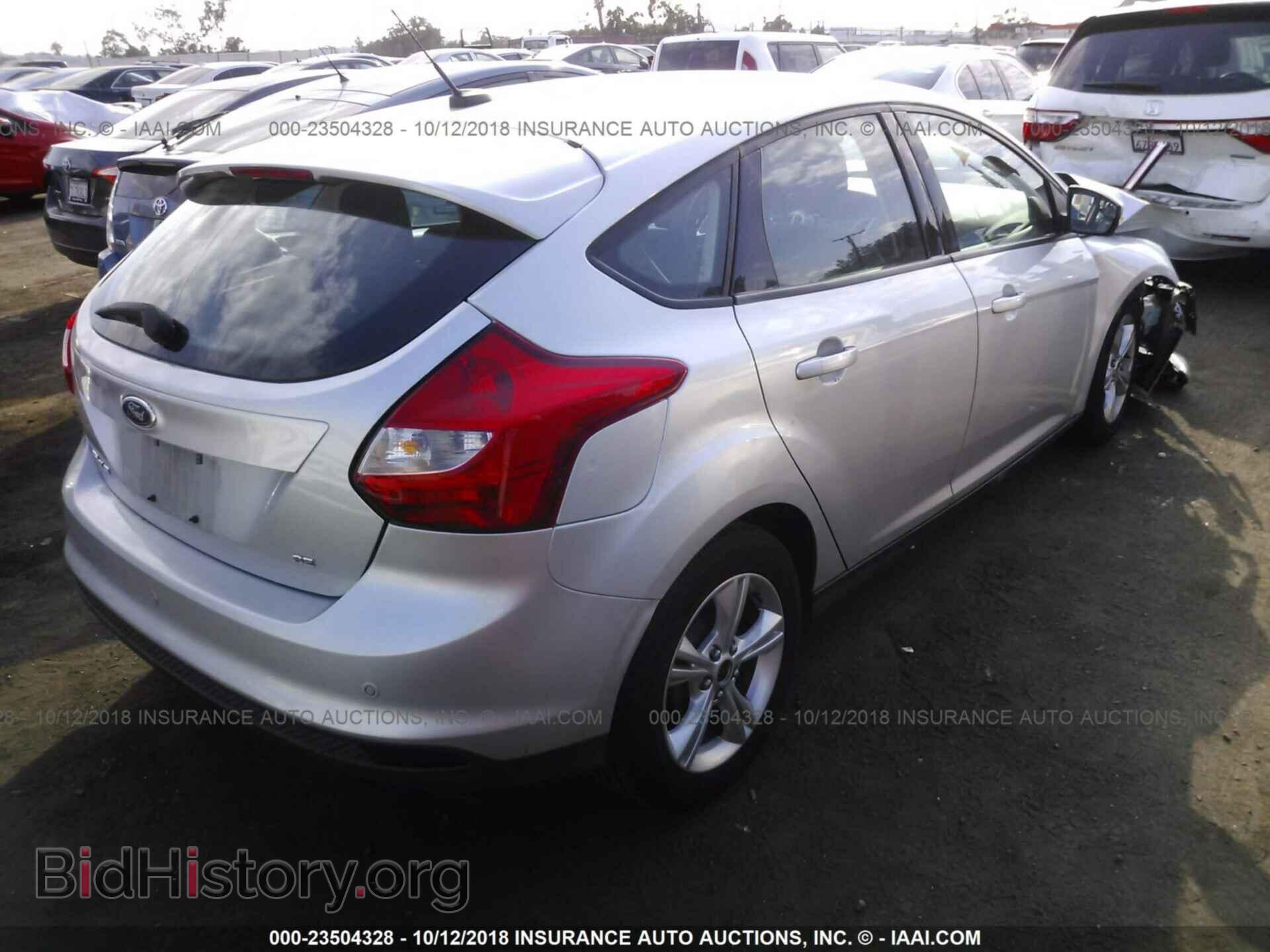 2014 Ford Focus - VIN: 1FADP3K27EL321378 - Фото 4