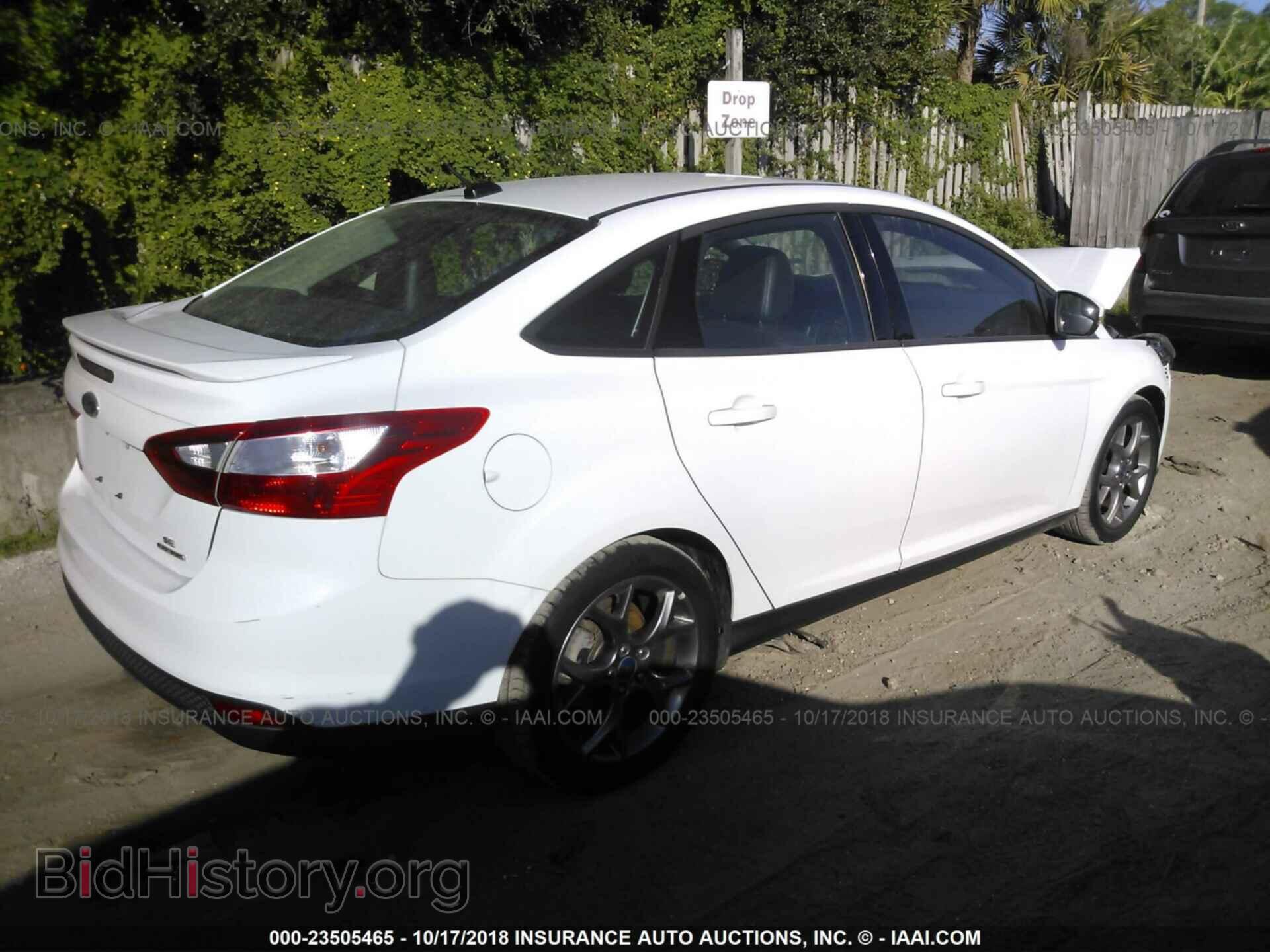 2013 Ford Focus - VIN: 1FADP3F21DL171387 - Фото 4