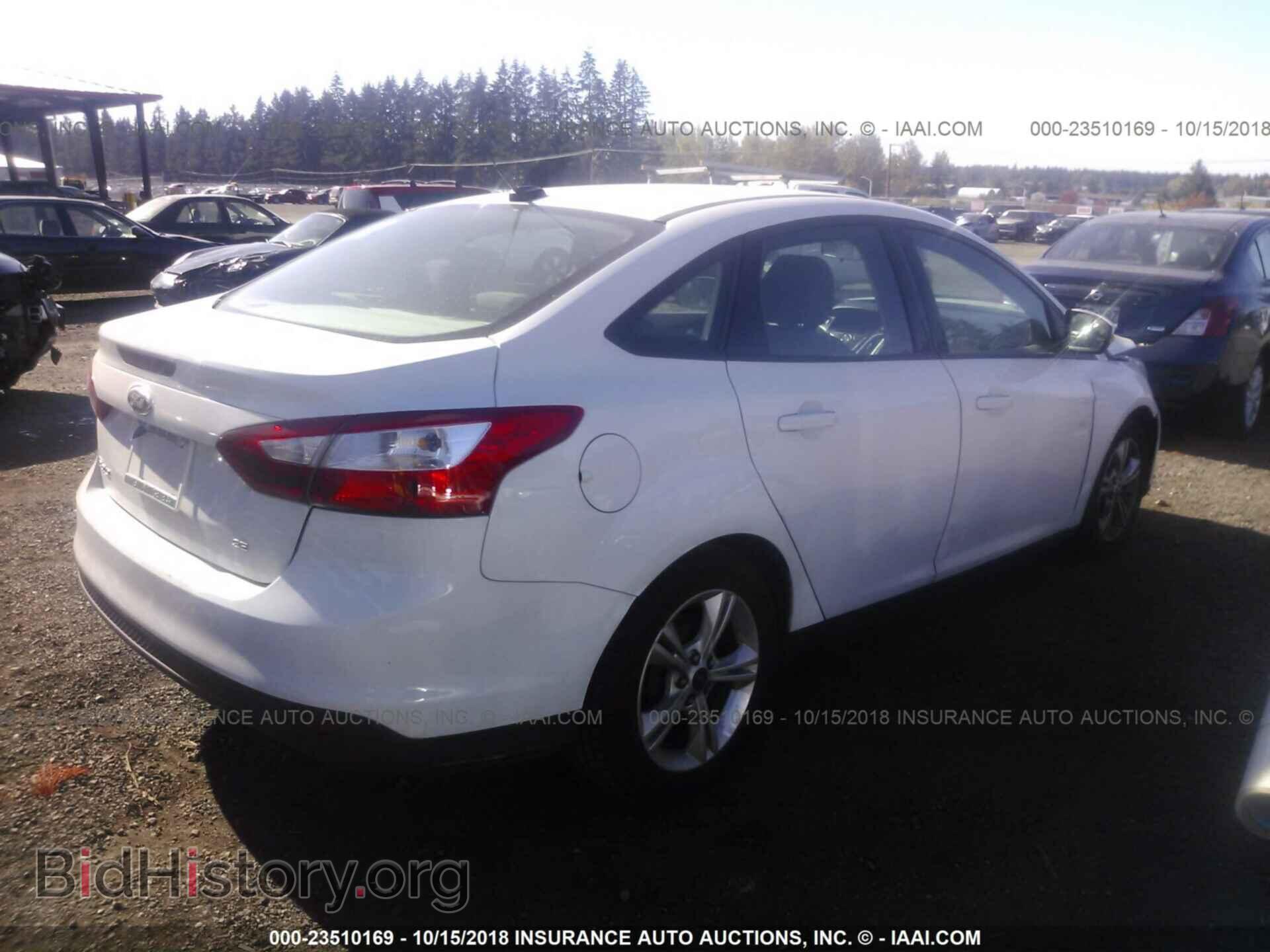 2014 Ford Focus - VIN: 1FADP3F23EL232076 - Фото 4