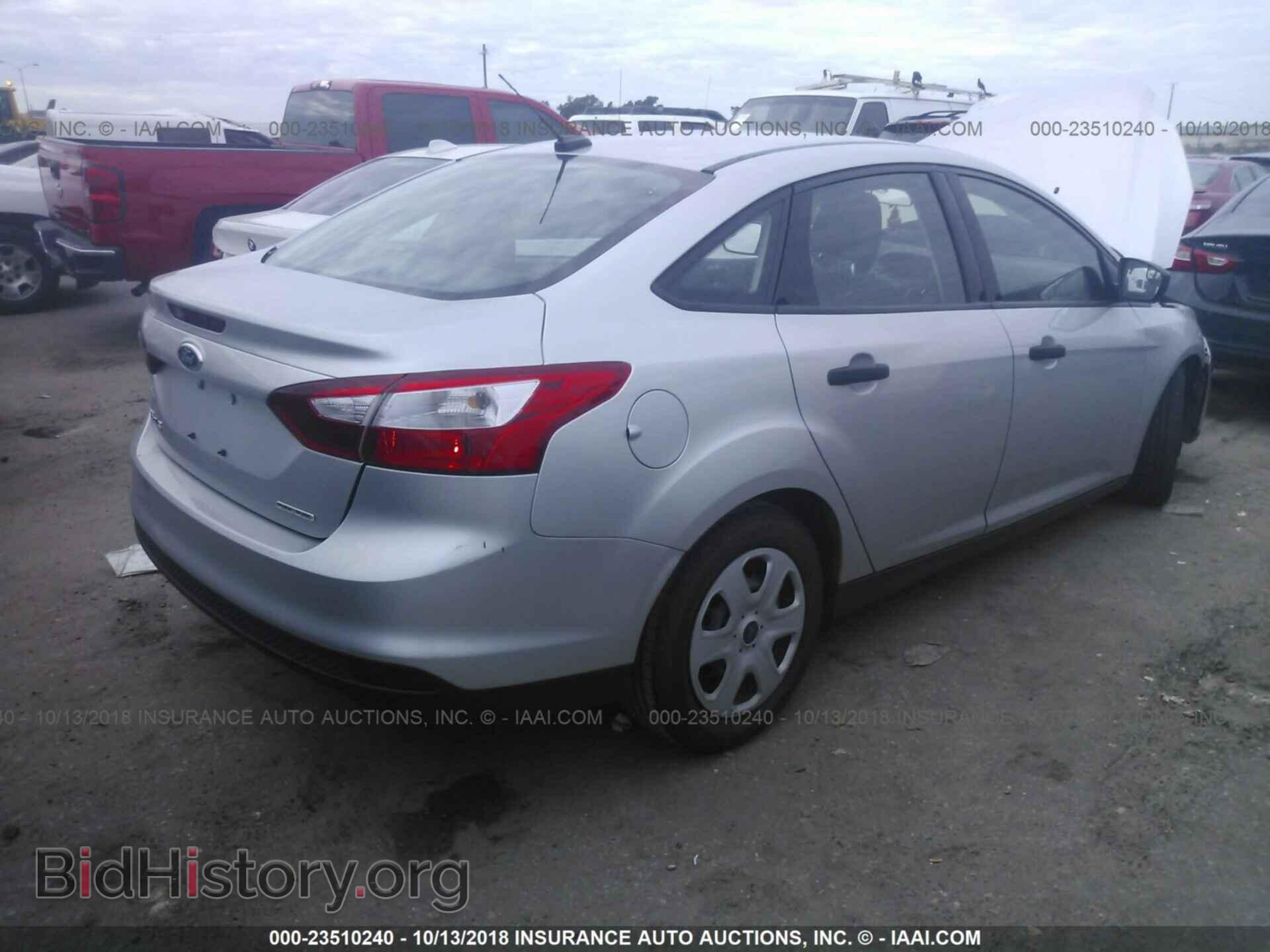 2014 Ford Focus - VIN: 1FADP3E24EL451372 - Фото 4