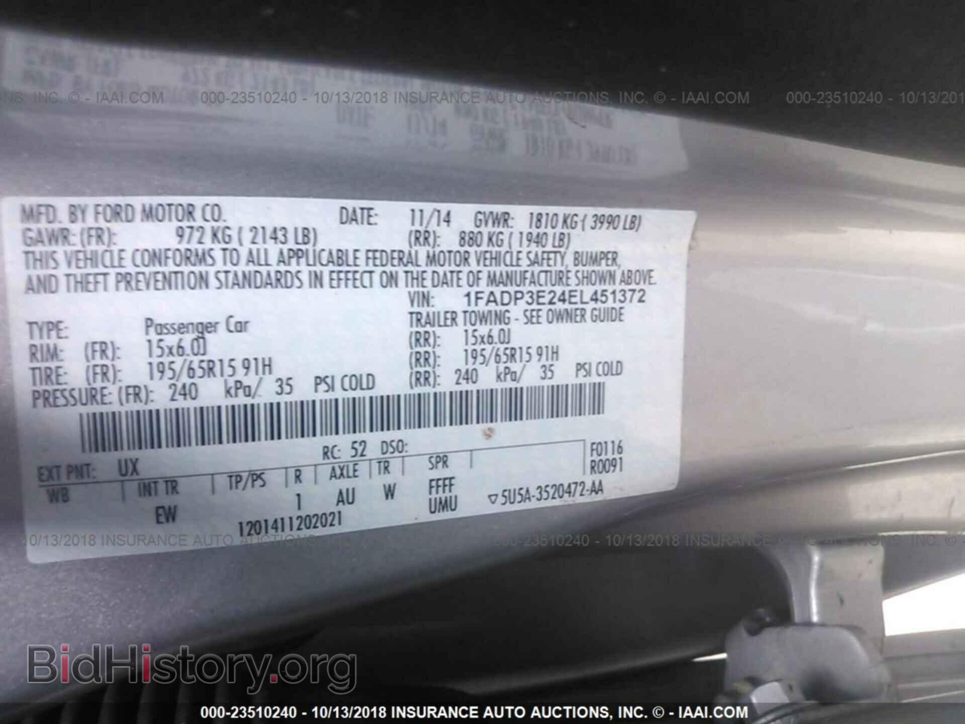 2014 Ford Focus - VIN: 1FADP3E24EL451372 - Фото 9