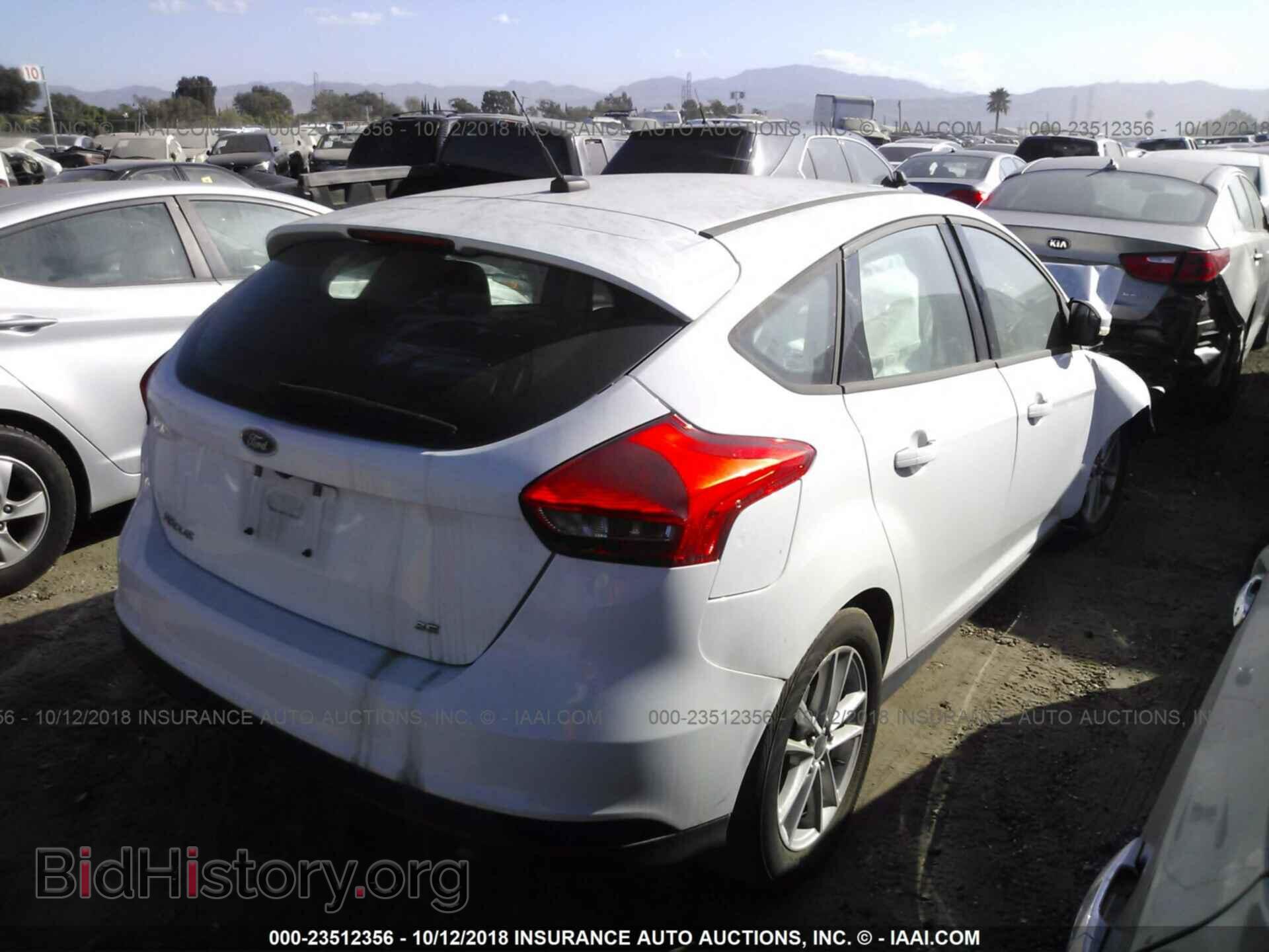 2015 Ford Focus - VIN: 1FADP3K22FL256232 - Photo 4