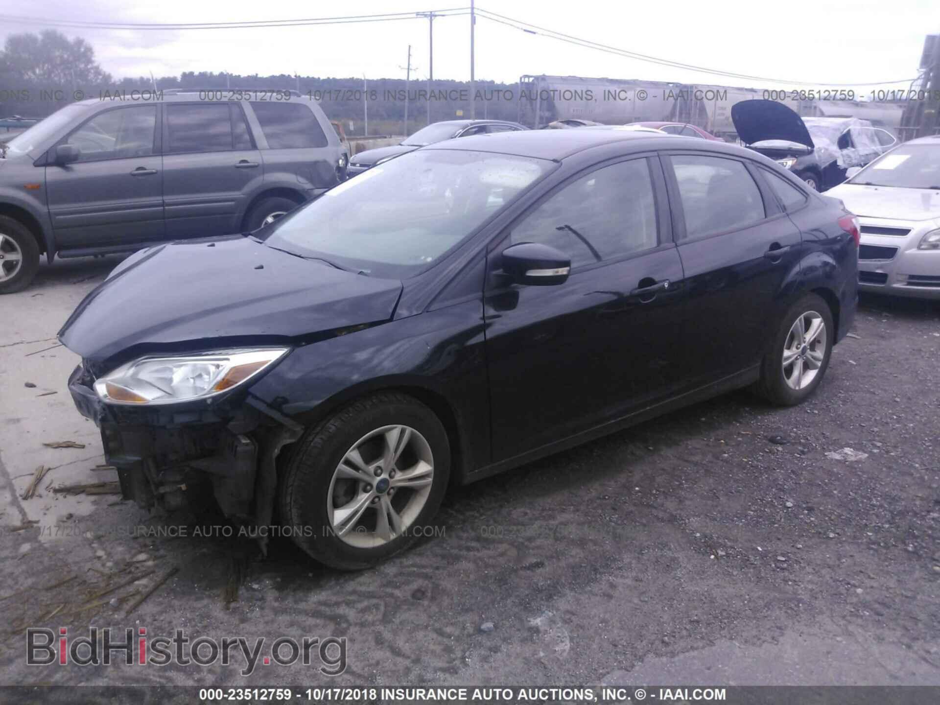 2014 Ford Focus - VIN: 1FADP3F23EL147674 - Photo 2