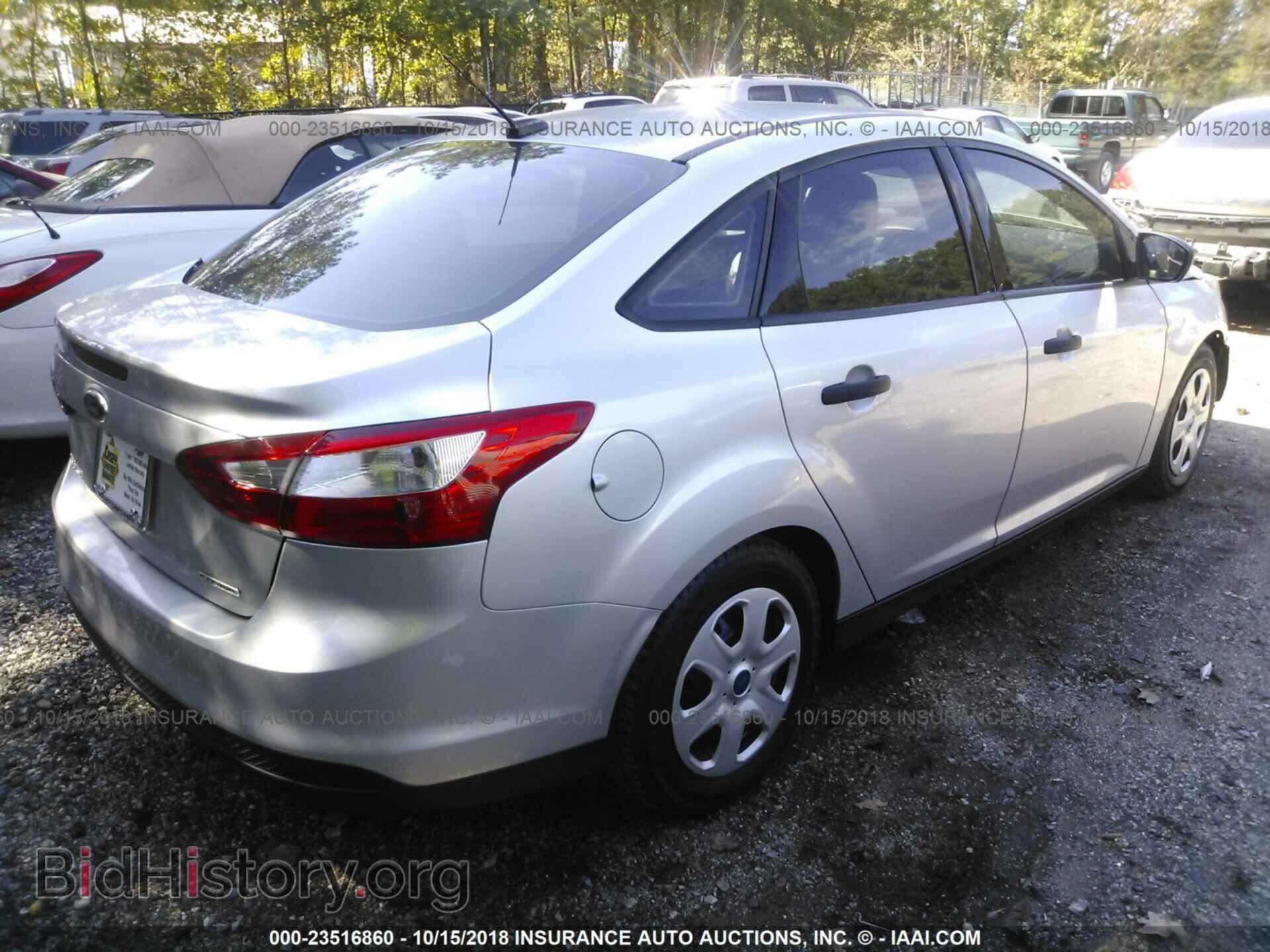 2014 Ford Focus - VIN: 1FADP3E23EL339436 - Photo 4