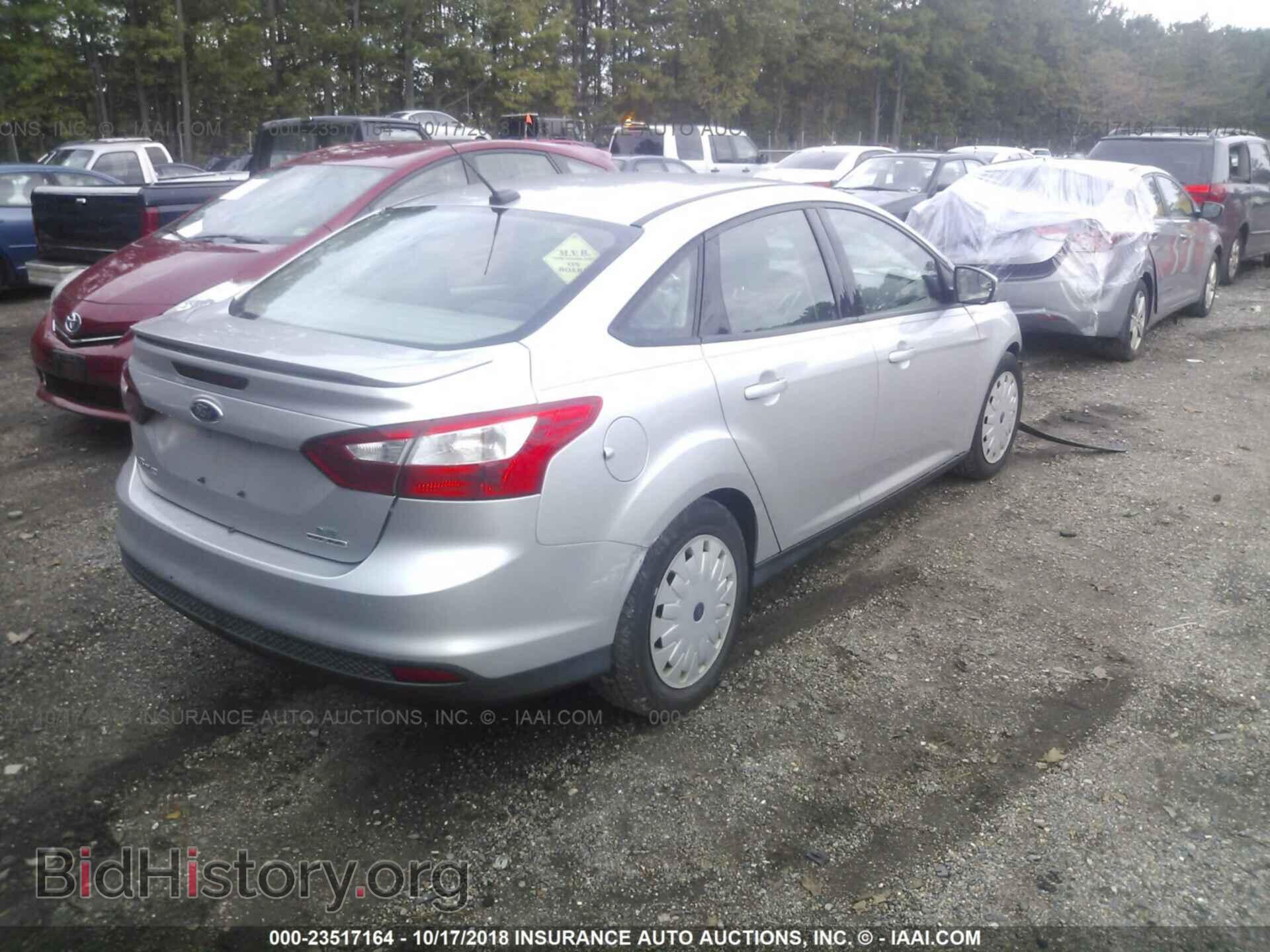 2014 Ford Focus - VIN: 1FADP3F26EL221766 - Photo 4