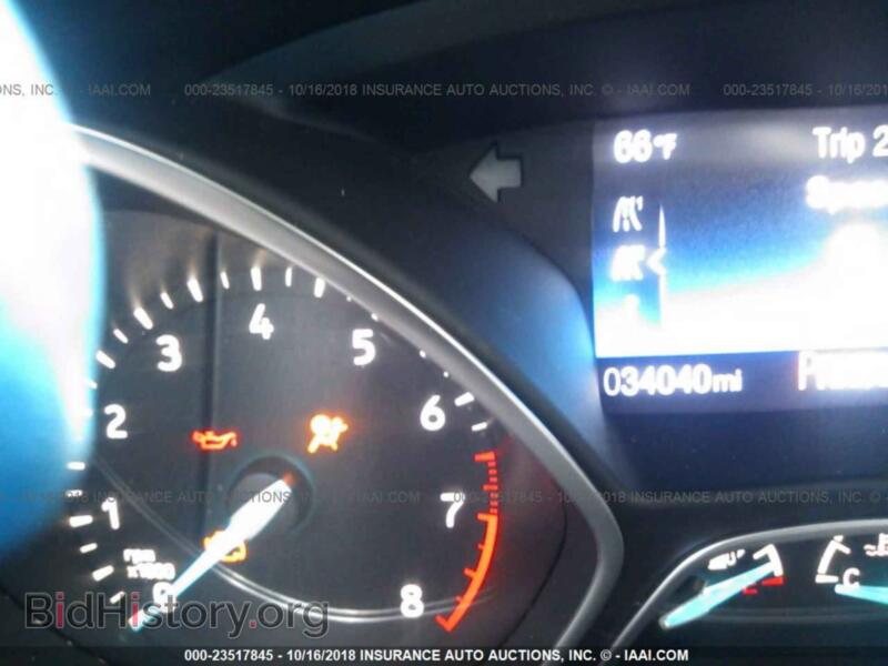 2016 Ford FOCUS (VIN 1FADP3F25GL220272) — фото 7 из 10
