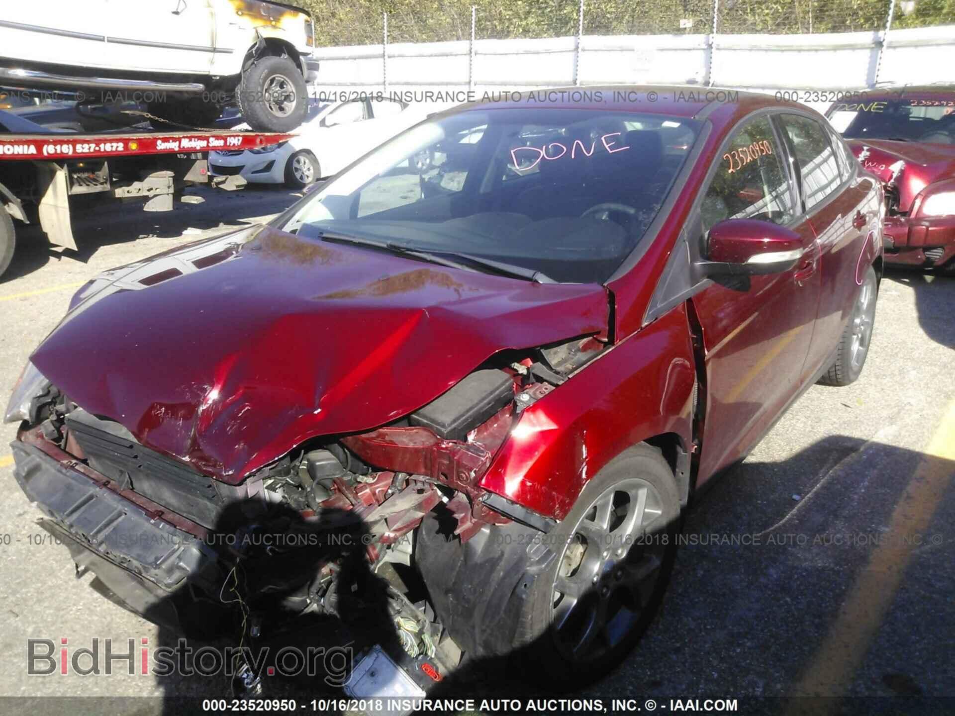 2014 Ford Focus - VIN: 1FADP3F22EL207556 - Photo 2
