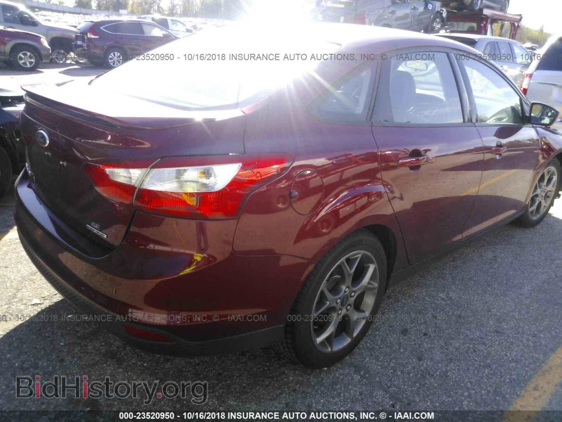 2014 Ford Focus - VIN: 1FADP3F22EL207556 - Photo 4