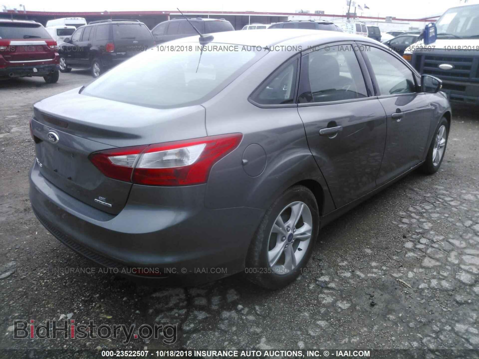 2014 Ford Focus - VIN: 1FADP3F20EL414804 - Фото 4