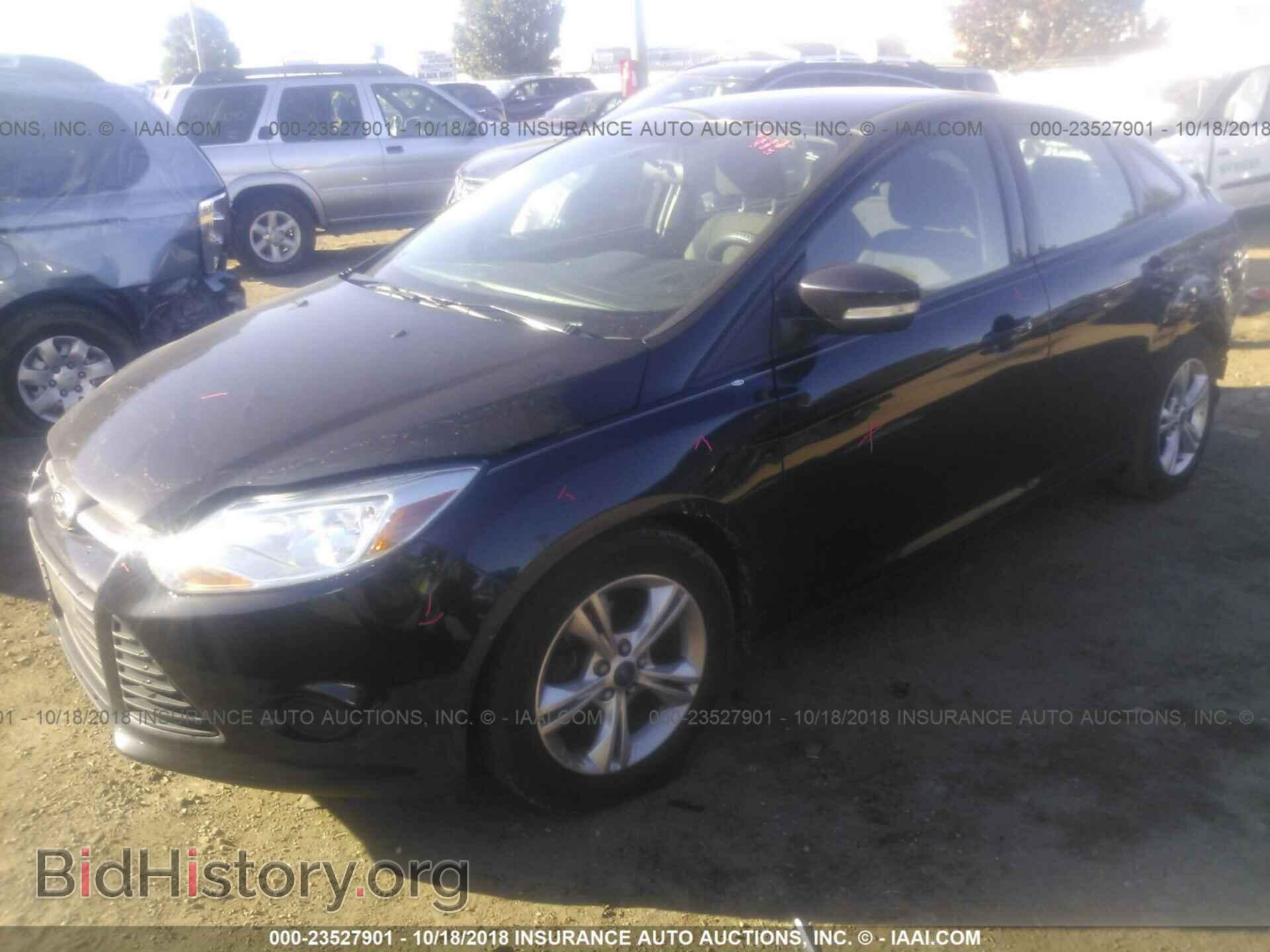 2014 Ford Focus - VIN: 1FADP3F22EL234403 - Фото 2