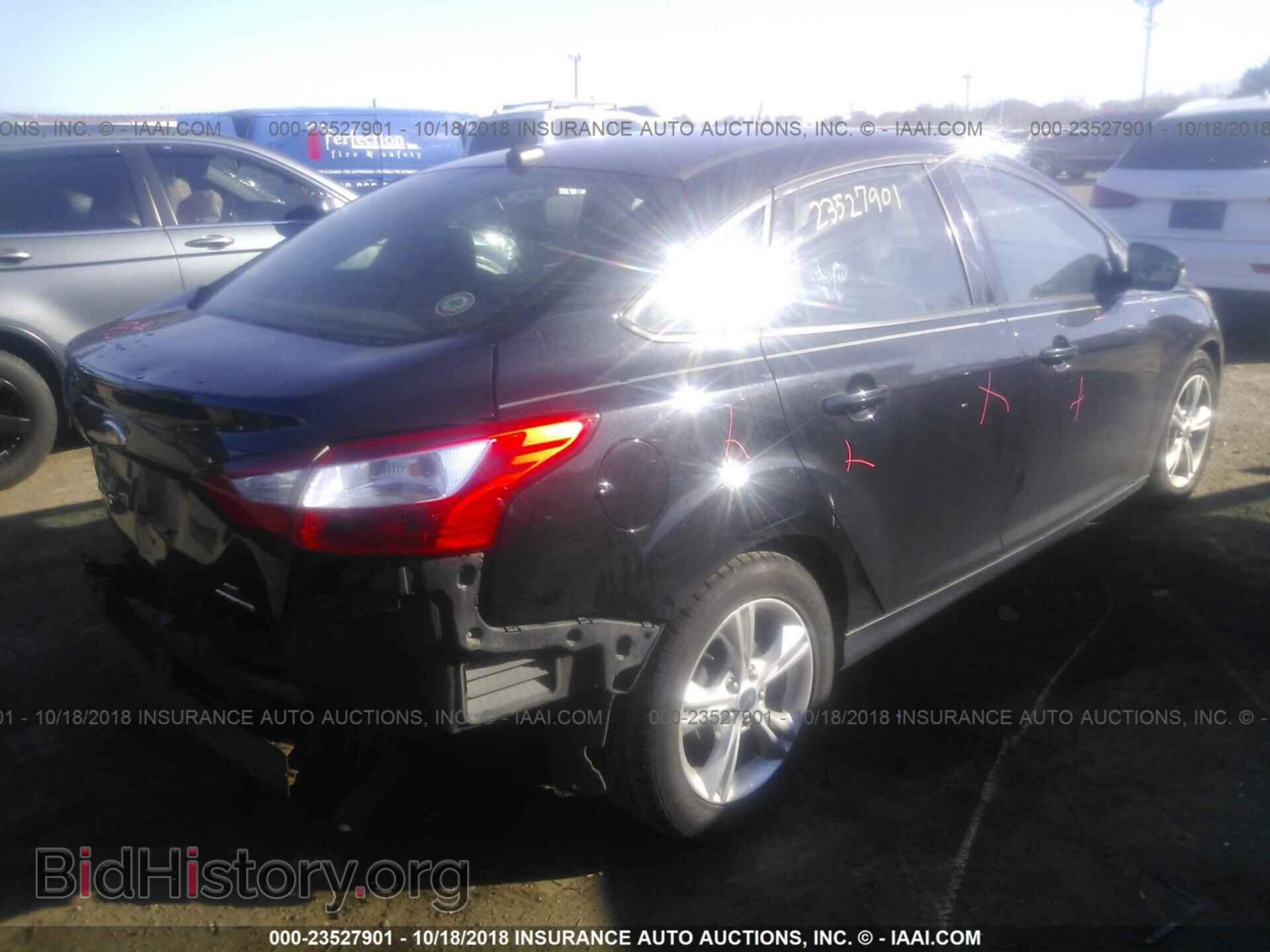 2014 Ford Focus - VIN: 1FADP3F22EL234403 - Фото 4
