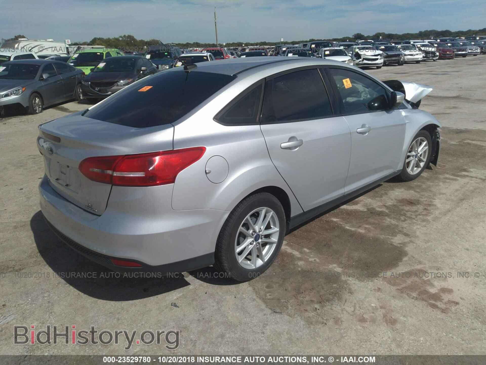2015 Ford Focus - VIN: 1FADP3F21FL206772 - Photo 4