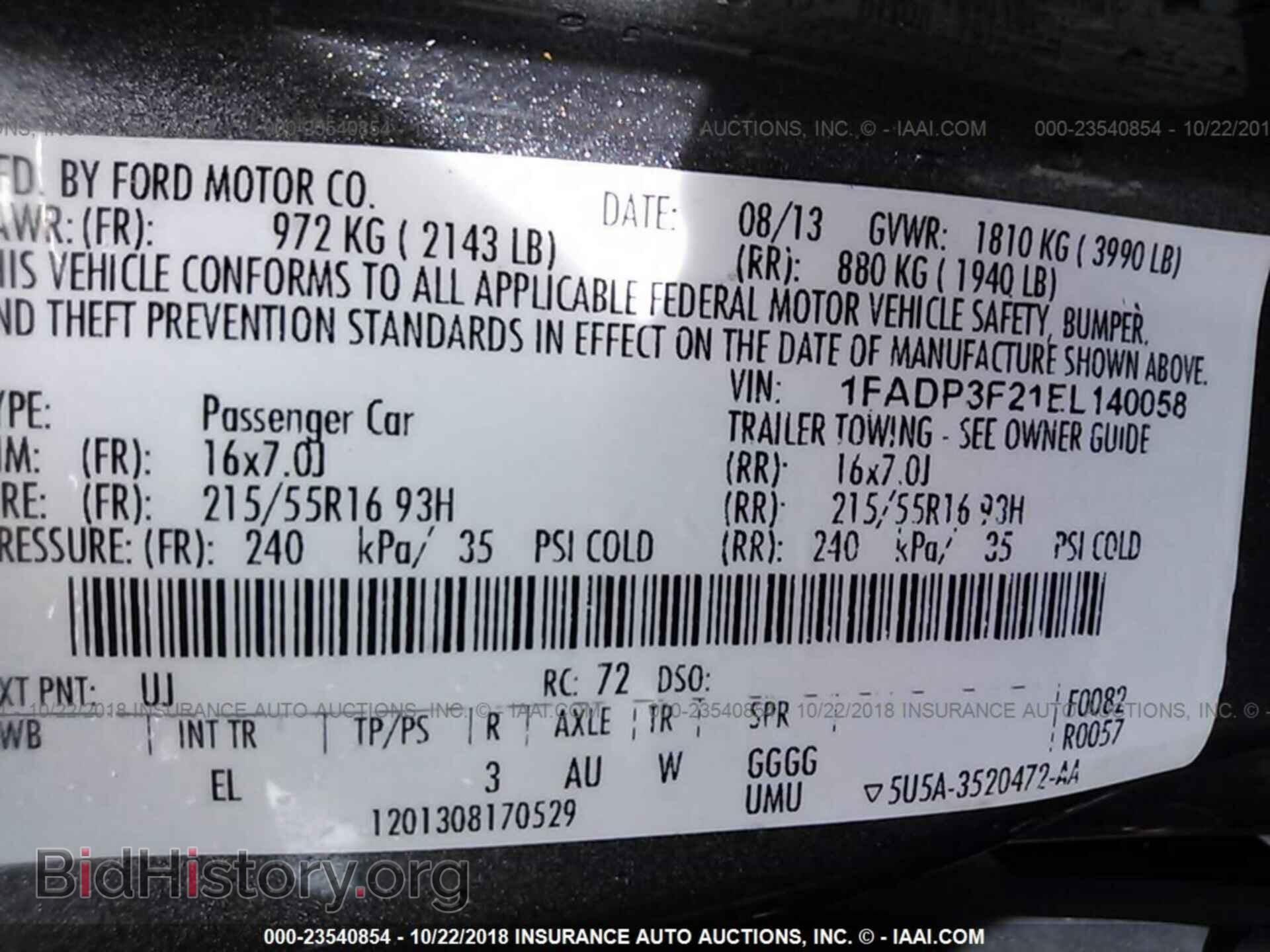 2014 Ford Focus - VIN: 1FADP3F21EL140058 - Photo 9