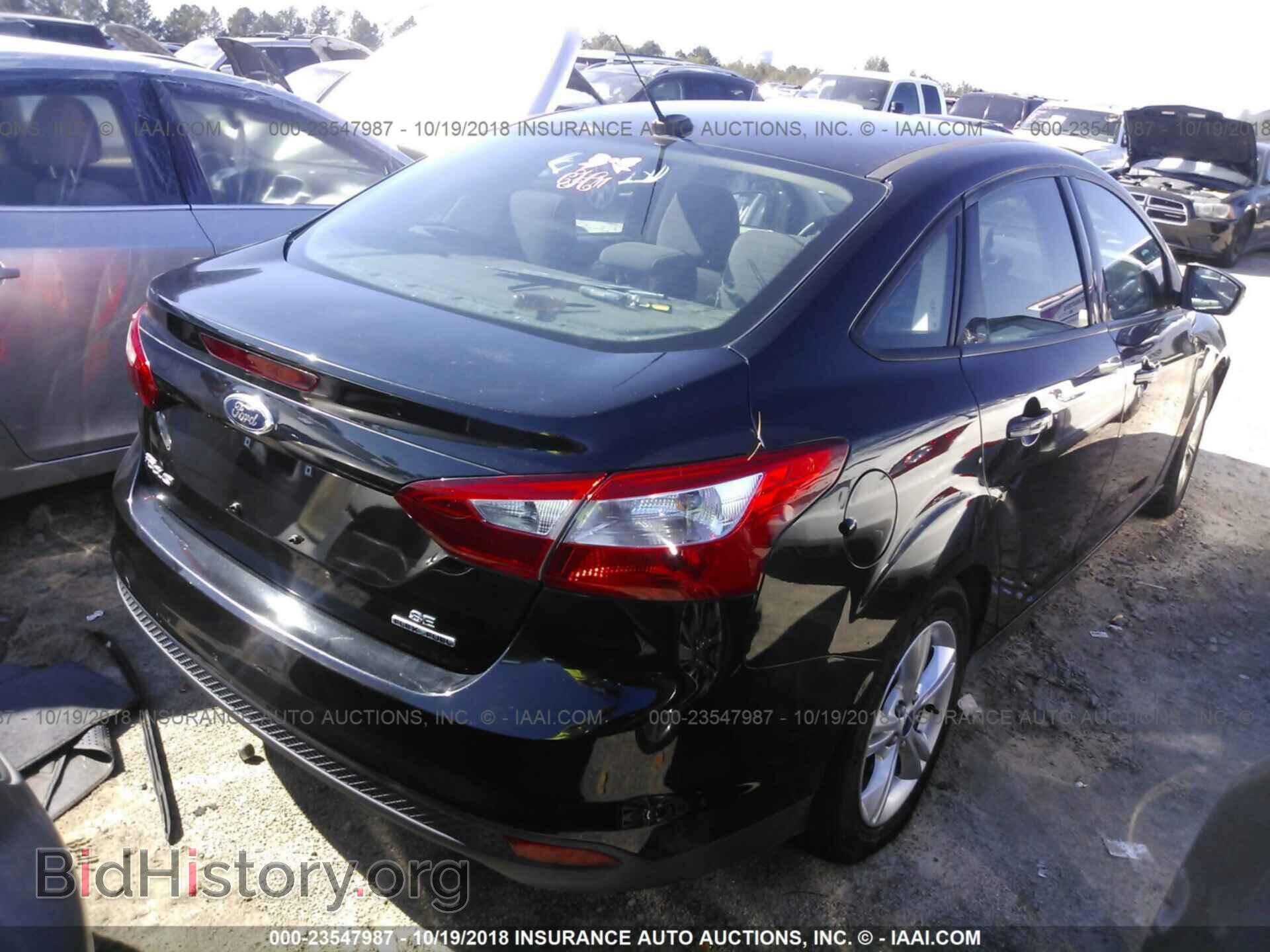 2014 Ford Focus - VIN: 1FADP3F20EL351025 - Фото 4