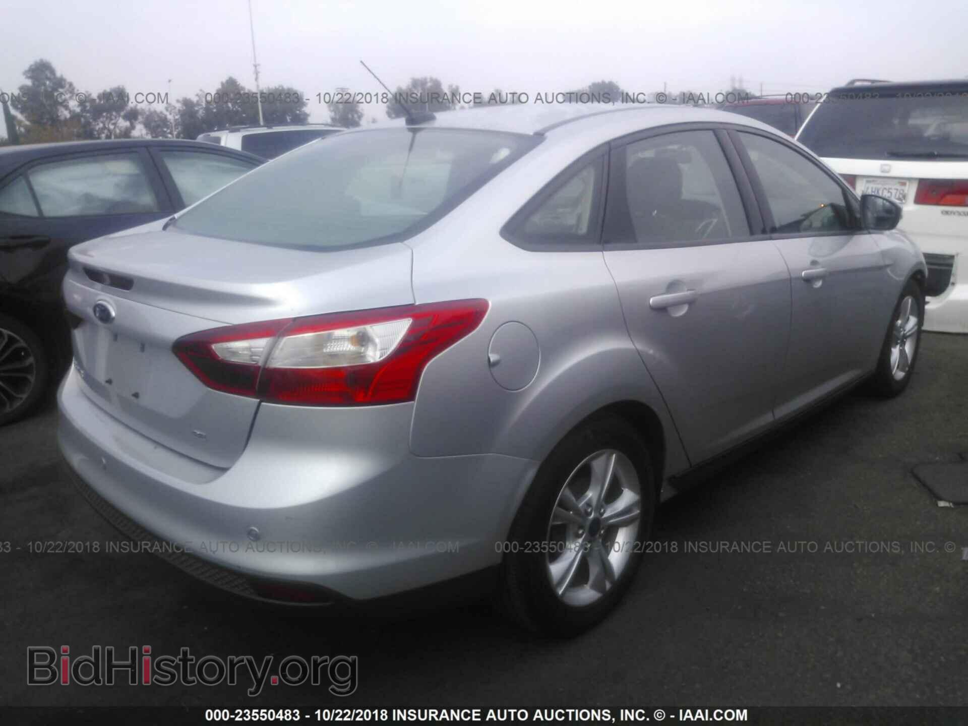 2014 Ford Focus - VIN: 1FADP3F22EL407529 - Фото 4