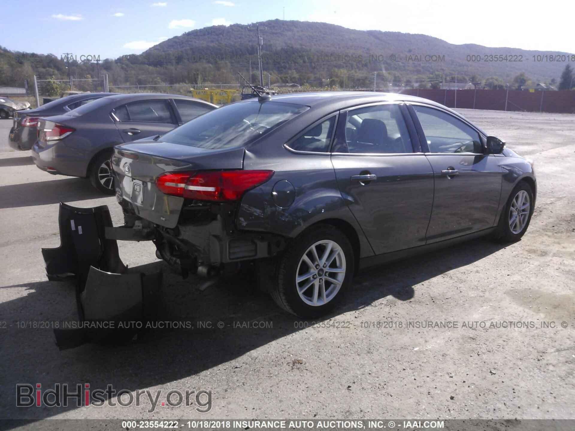 2015 Ford Focus - VIN: 1FADP3F21FL215875 - Фото 4