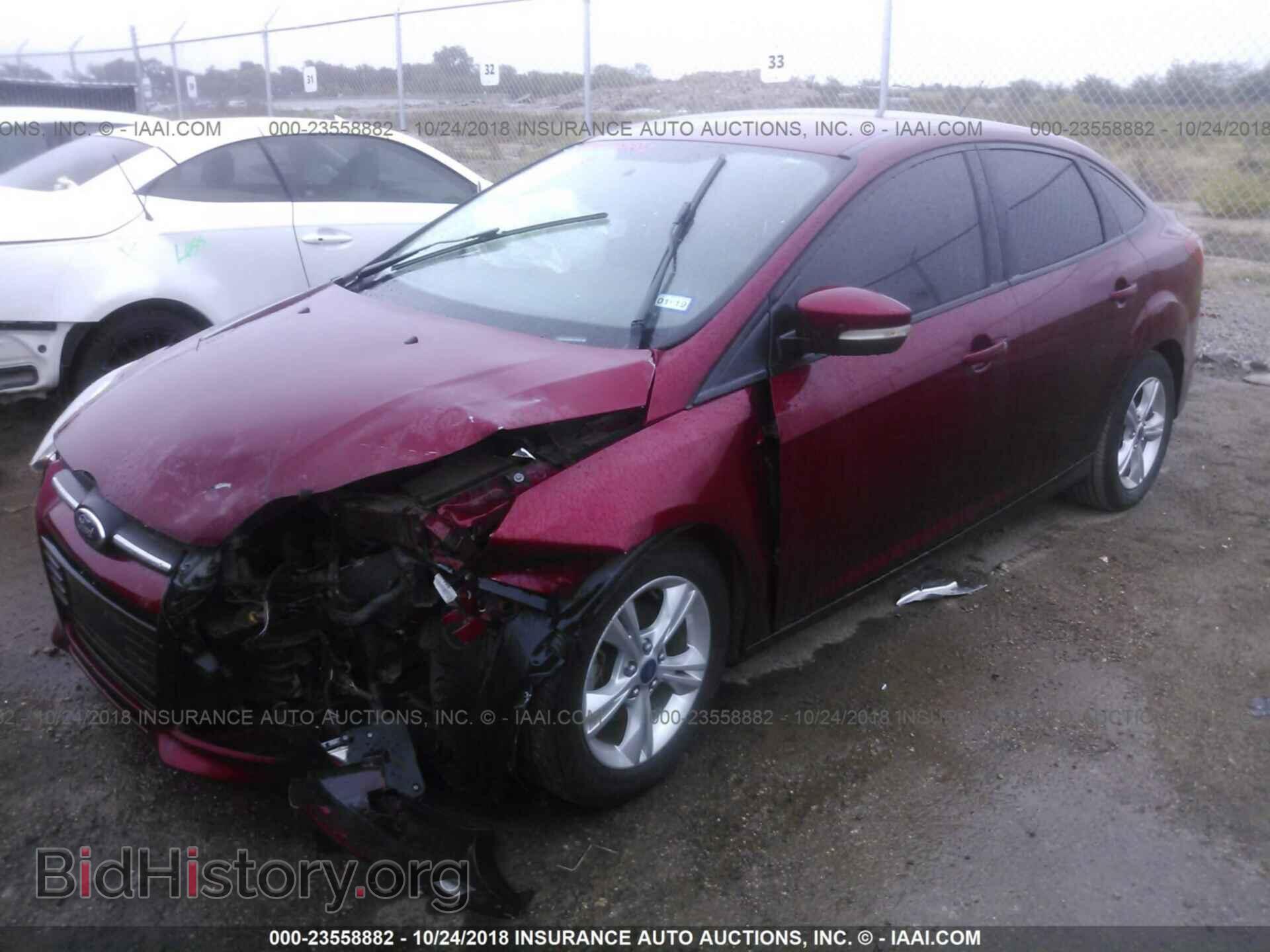 2013 Ford Focus - VIN: 1FADP3F26DL115672 - Photo 2