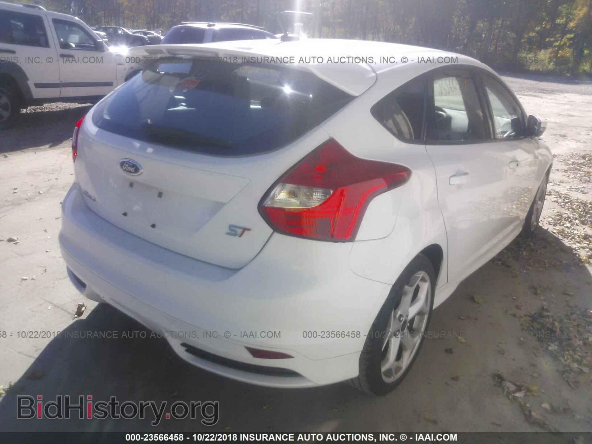 2014 Ford Focus - VIN: 1FADP3L97EL445730 - Photo 4