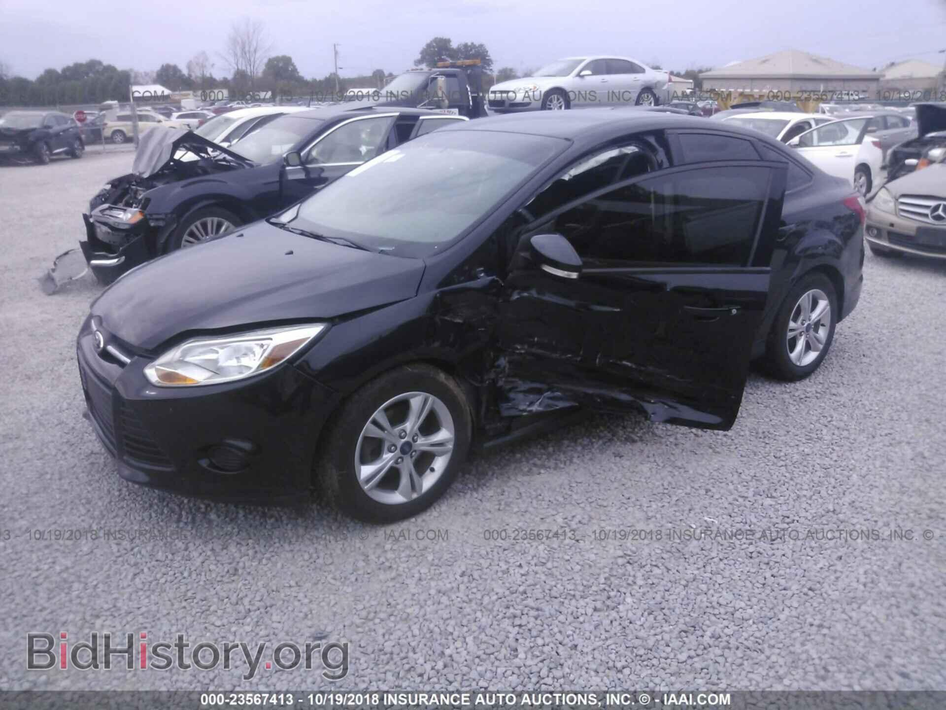 2014 Ford Focus - VIN: 1FADP3F29EL135724 - Фото 2